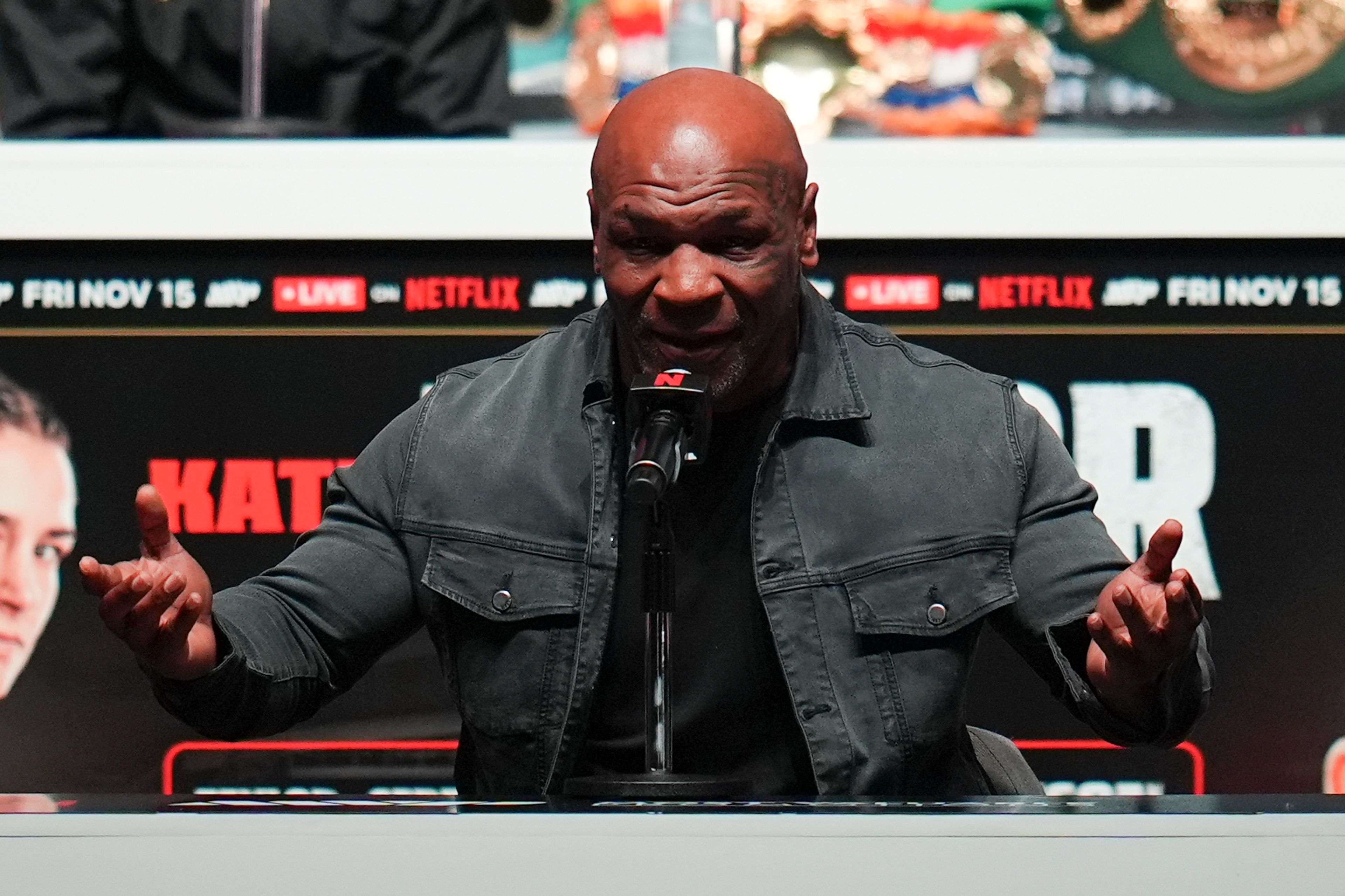 Mike Tyson speaks during a news conference ahead of his fight against Jake Paul, Wednesday, Nov. 13, 2024, in Irving, Texas. (AP Photo/Julio Cortez)