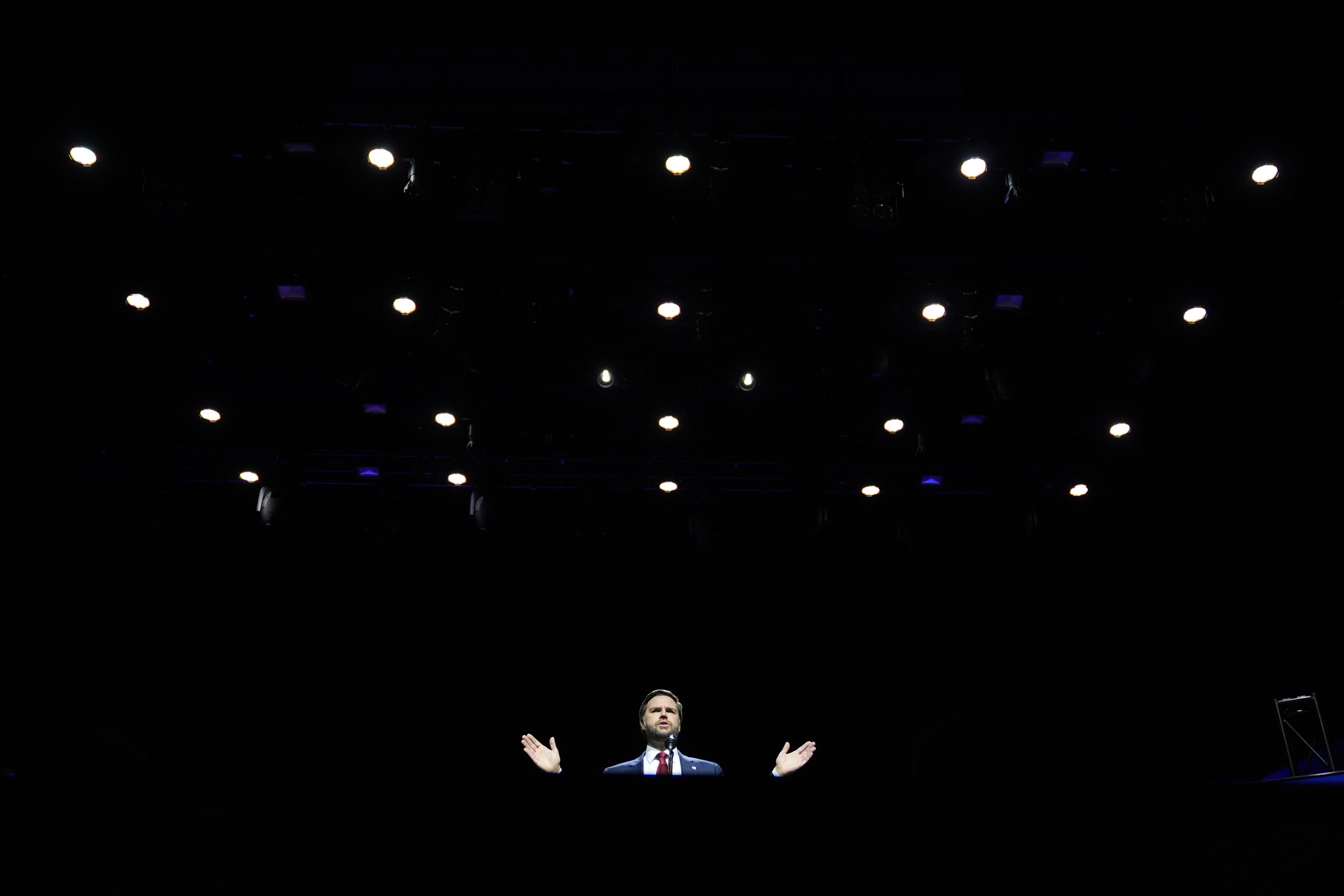 Republican vice presidential nominee Sen. JD Vance, R-Ohio speaks at during a campaign rally at FIM Capitol Theatre, Monday, Nov. 4, 2024, in Flint, Mich. (AP Photo/Paul Sancya)