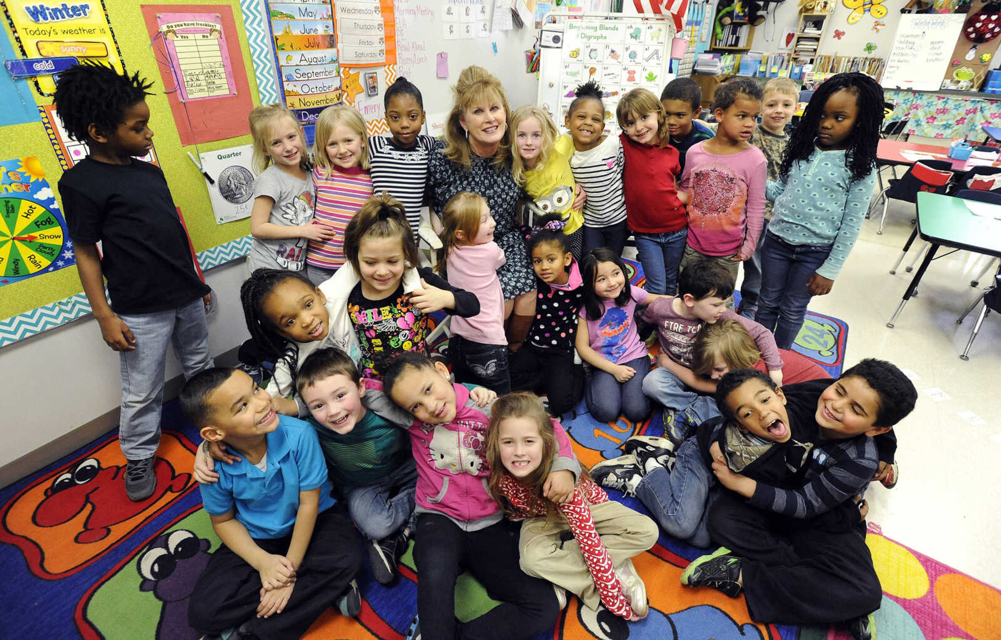 LAURA SIMON ~ lsimon@semissourian.com

Kindergarten students surround Blanchard Elementary principal, Barbara Kohlfeld, for a group photo, Monday, Feb. 8, 2016. The Cape Girardeau school was named a National Blue Ribbon School by the U.S. Department of Education.