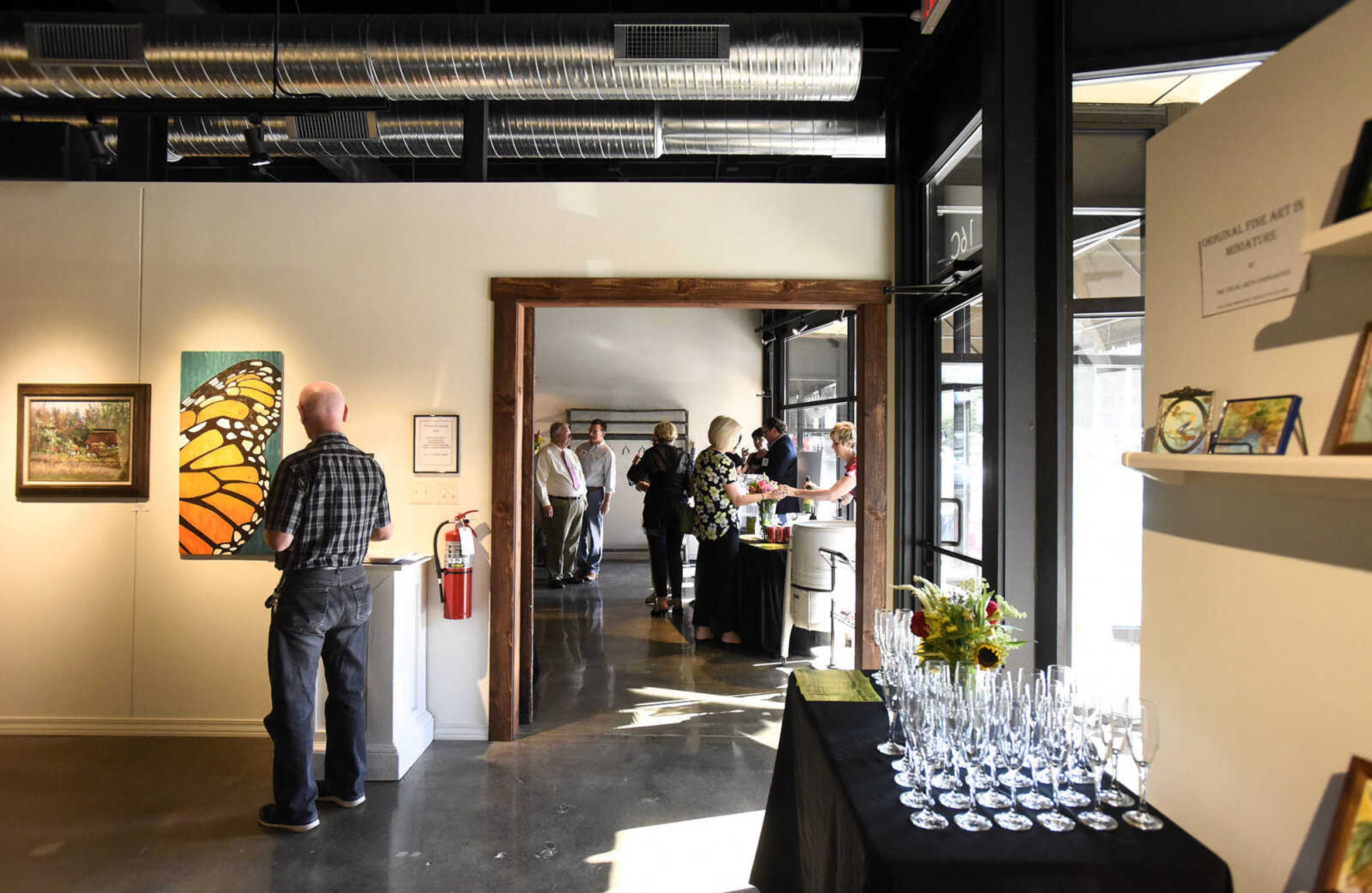 LAURA SIMON ~ lsimon@semissourian.com

People take in the grand opening reception for the 4th annual Members Exhibit at the Arts Council of Southeast Missouri in its new location at 16 North Spanish Street in downtown Cape Girardeau on Friday, Sept. 2, 2016.