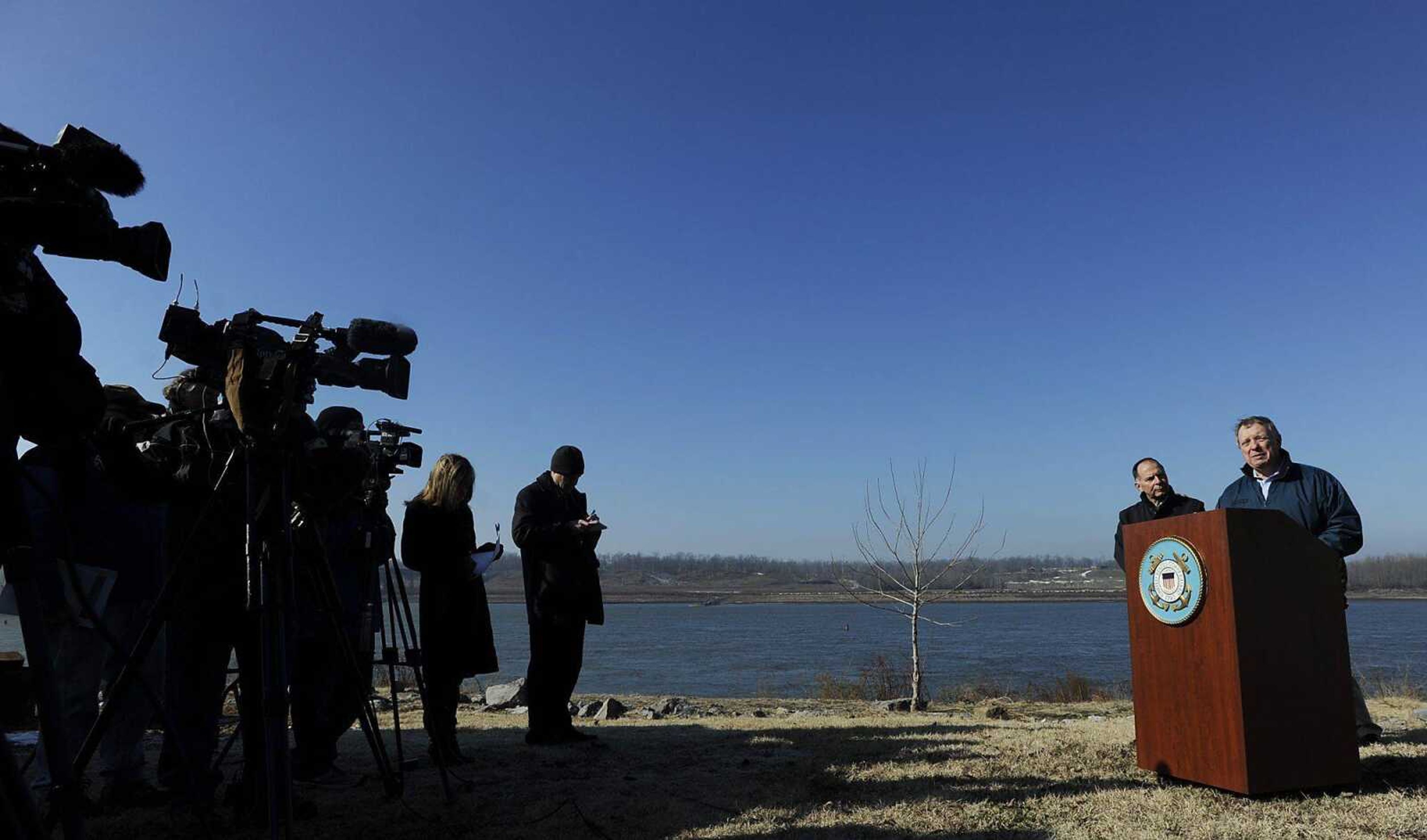 Rep. Bill Enyart, left, and Sen. Dick Durbin answer questions during a press conference about the U.S. Army Corps of Engineers' ongoing efforts by to remove rock from the Mississippi River channel Monday, Jan. 7, at Thebes, Ill. (ADAM VOGLER)