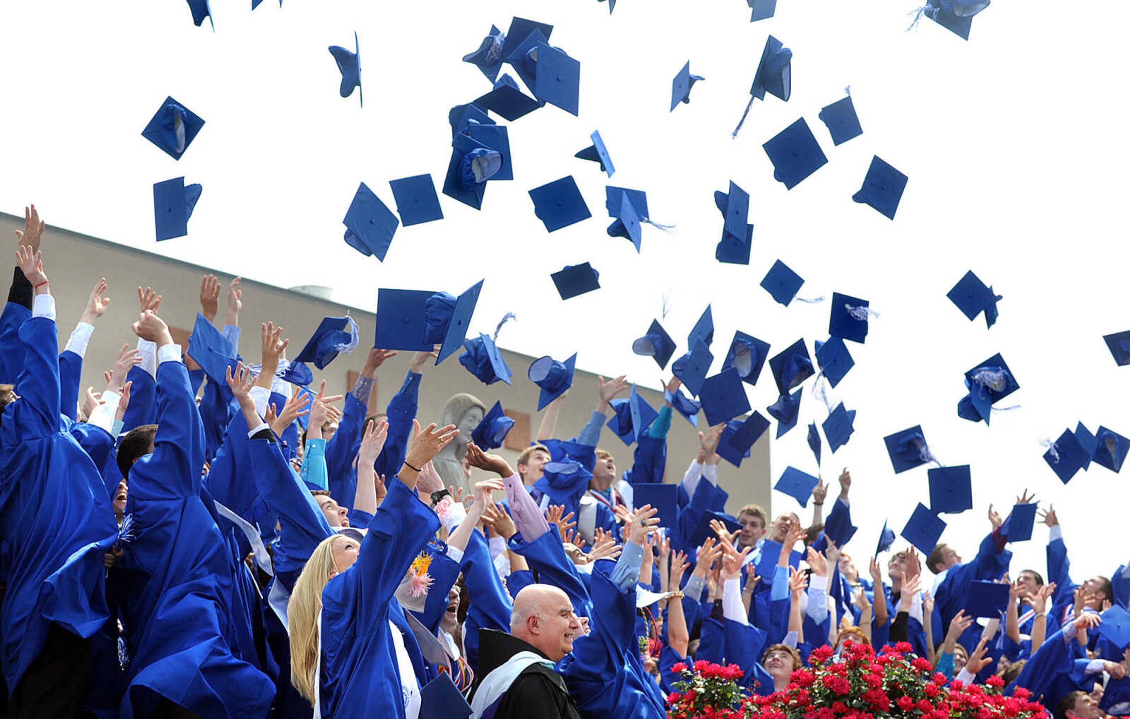 LAURA SIMON ~ lsimon@semissourian.com

The eighty-fifth graduating class of Notre Dame Regional High School throw their hats in the air, Sunday, May 19, 2013, in celebration of their commencement.