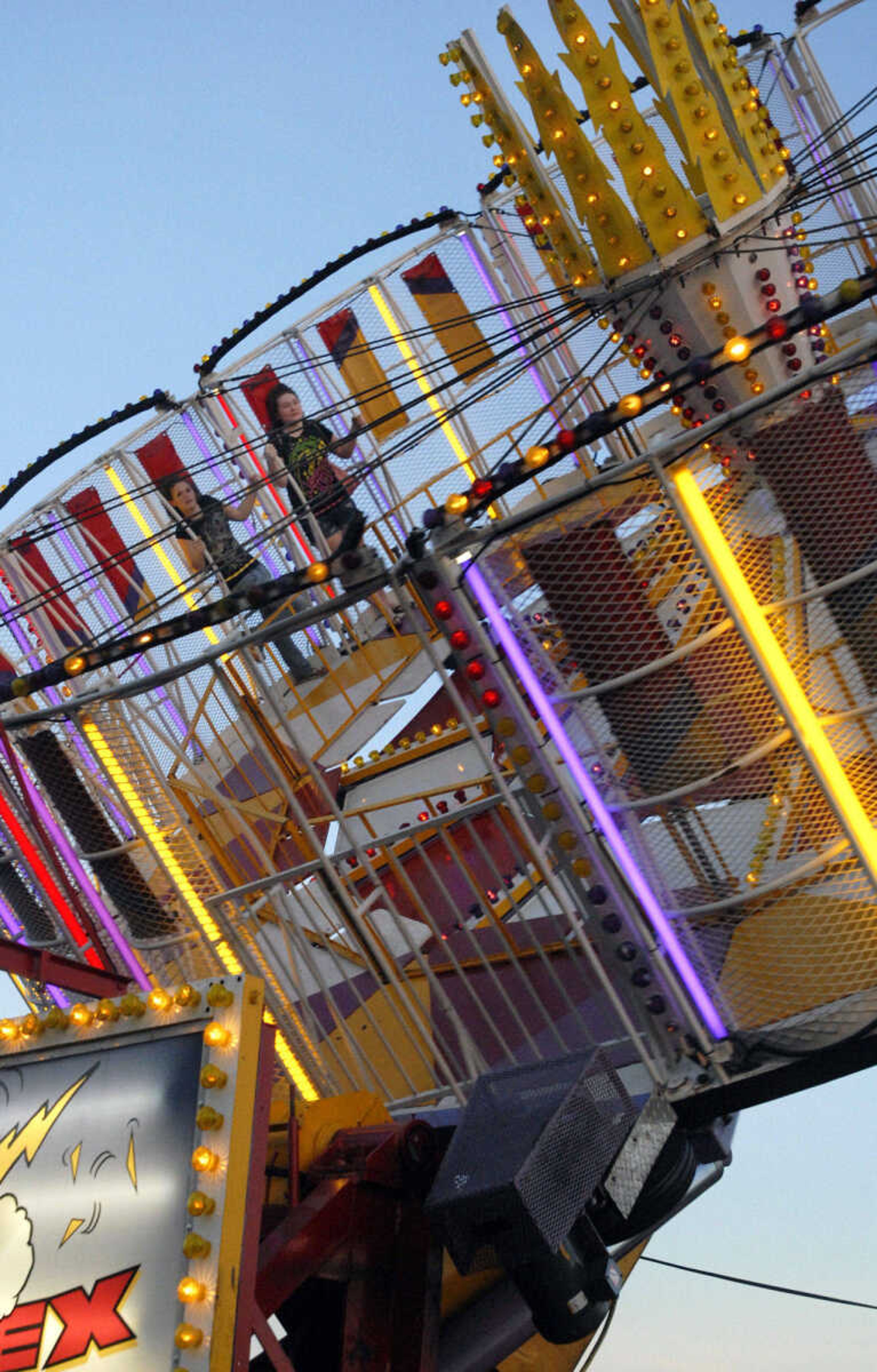 KRISTIN EBERTS ~ keberts@semissourian.com

Katlyn Capentier, left, and Alexandria Kelley ride the Vortex at the 102nd Annual Homecomers Celebration in downtown Jackson on Tuesday, July 27, 2010. Tuesday marked the opening day of the celebration, which lasts through Saturday.