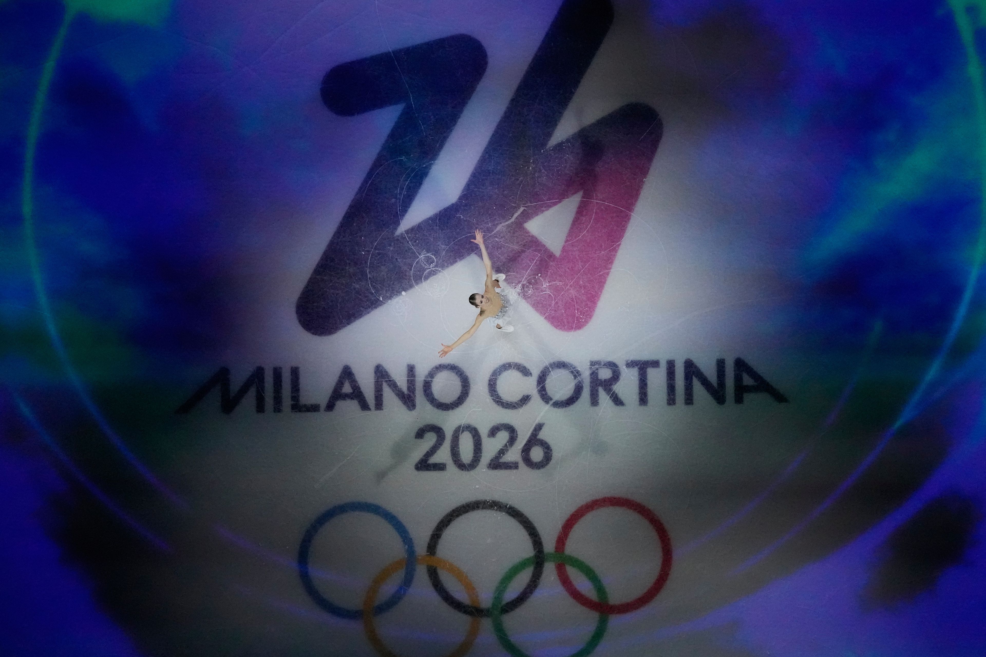 Carolina Kostner performs during an exhibition gala at the 2026 Winter Olympics, in Milan, Italy, Saturday, Feb. 21, 2026. (AP Photo/Christophe Ena)