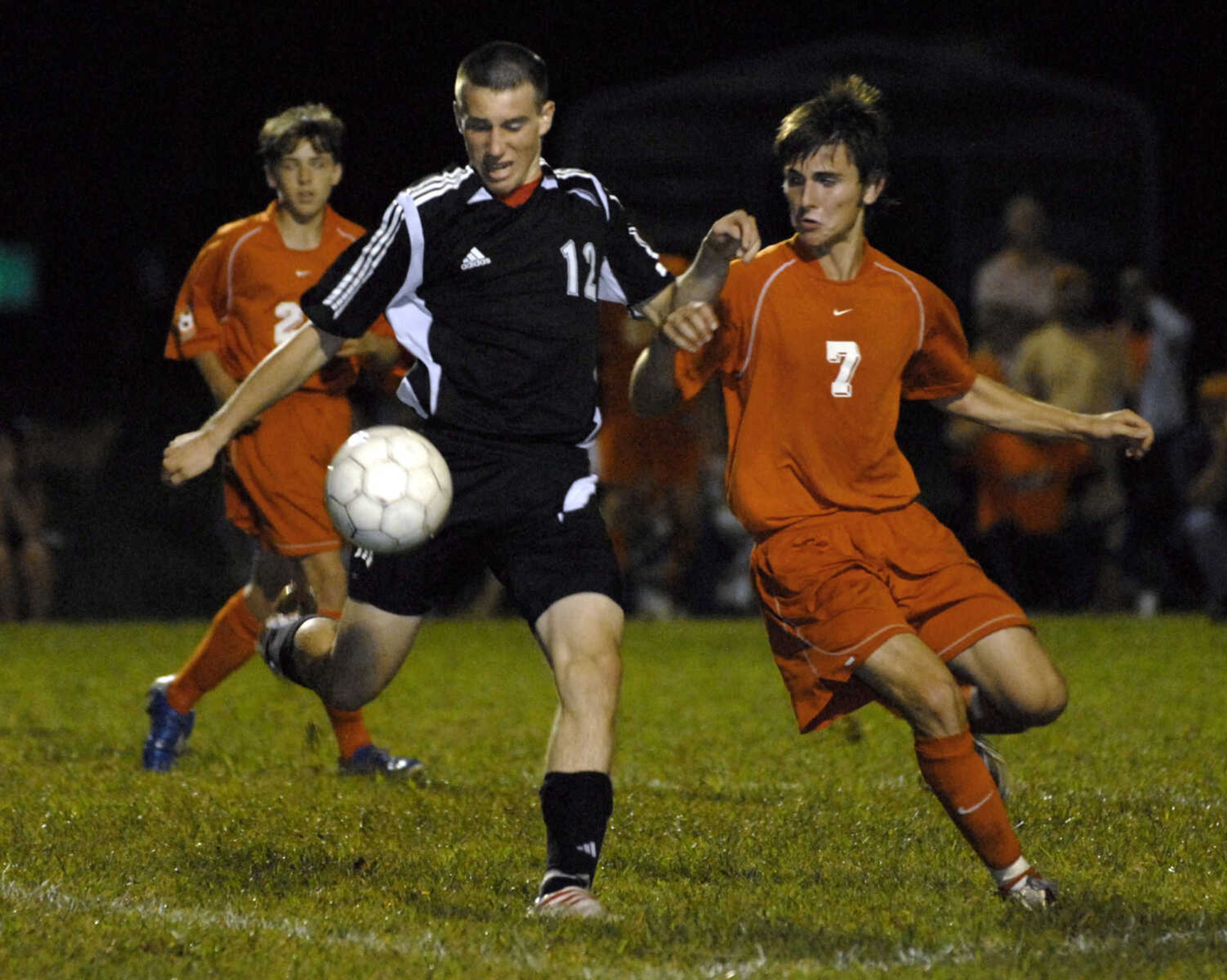 FRED LYNCH ~ flynch@semissourian.com
Jackson's Todd Heuring sets to kick the ball away from Central's Michael Denmark during the second half Tuesday at Central.