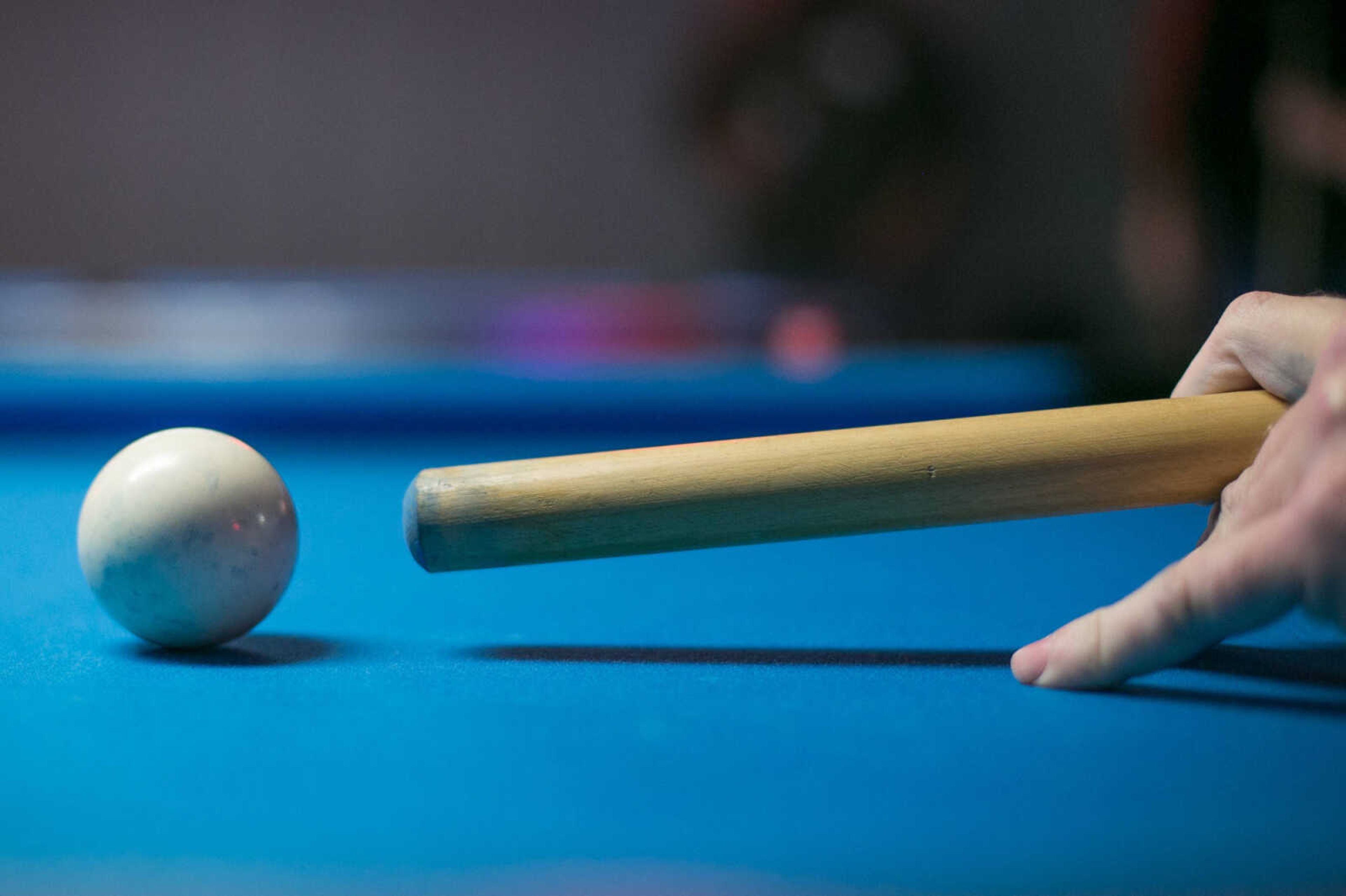 GLENN LANDBERG ~ glandberg@semissourian.com

A participant lines up a shot during the annual broomstick pool tournament Saturday, Feb. 27, 2016 at JR's Bar & Billiards in Cape Girardeau.