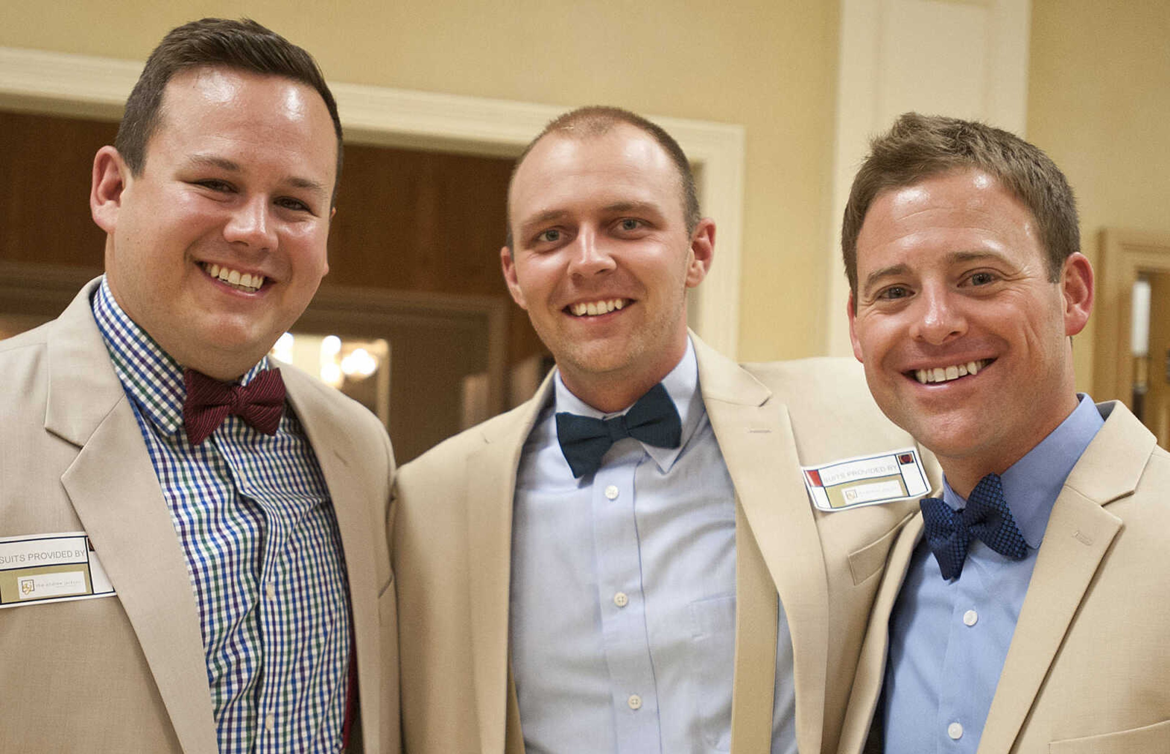 TJ Bishop, left, Brandon Cooper and Seth Hudson at the Lutheran Family and Children's Services Foundation's "Boas & Bling, Kentucky Derby Party," Thursday, May 1, at The Venue in Cape Girardeau.