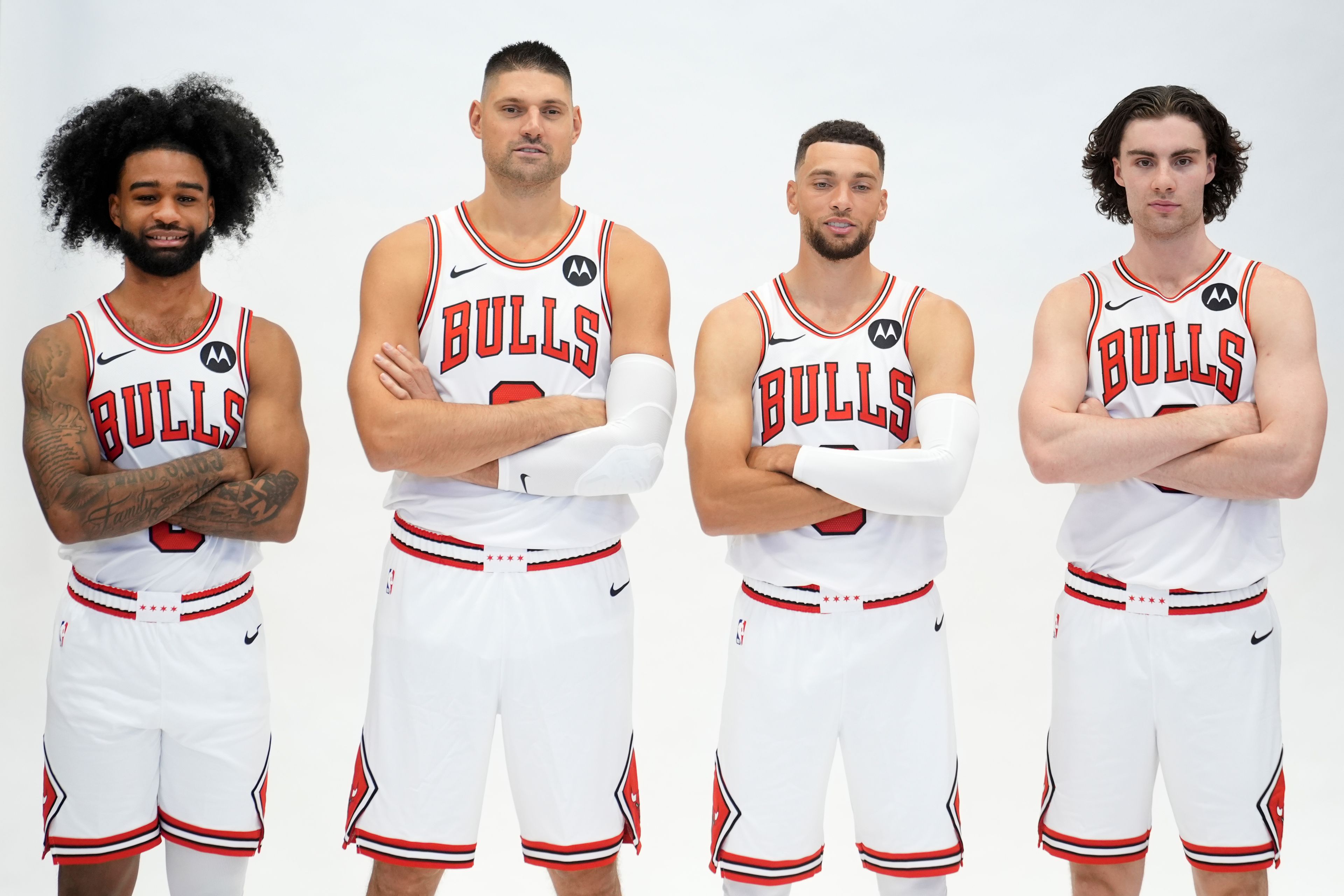 Chicago Bulls from left, Coby White, Nikola Vucevic, Zach LaVine and Josh Giddey stand for a portrait during the NBA basketball team's media day Monday, Sept. 30, 2024, in Chicago. (AP Photo/Charles Rex Arbogast)