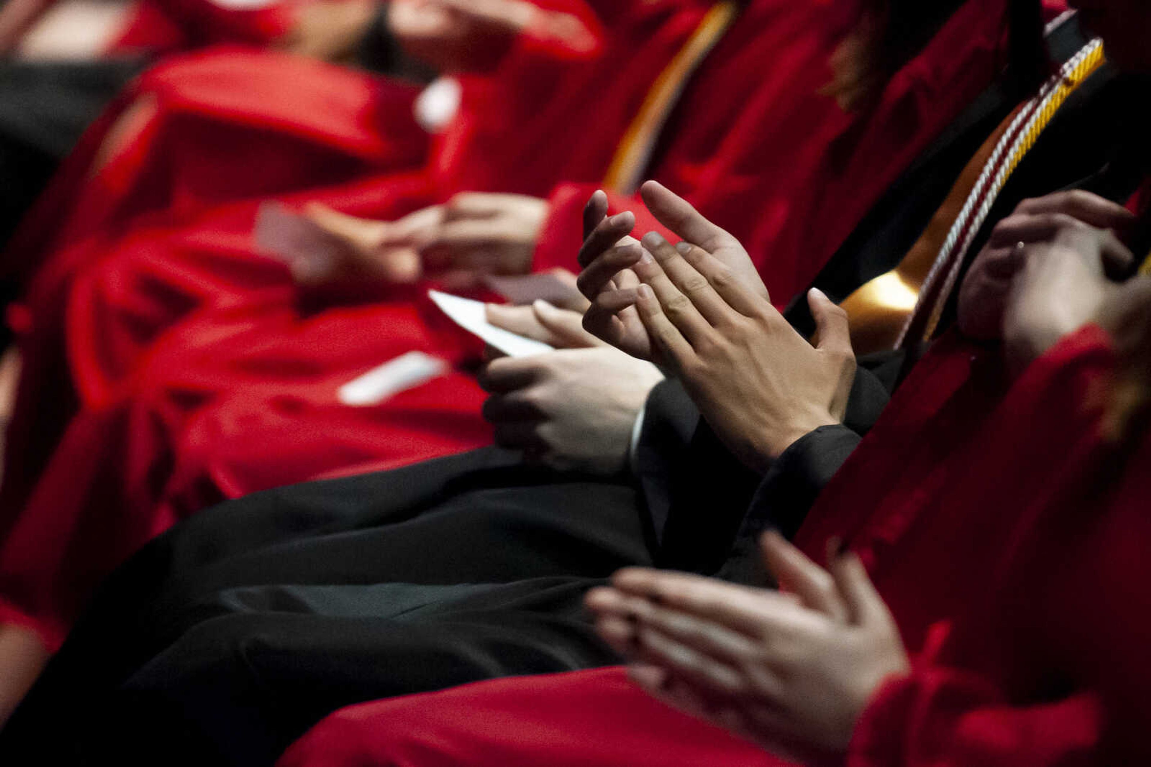 Graduates applaud during the Jackson High School Class of 2019 Commencement at the Show Me Center Friday, May 24, 2019, in Cape Girardeau.