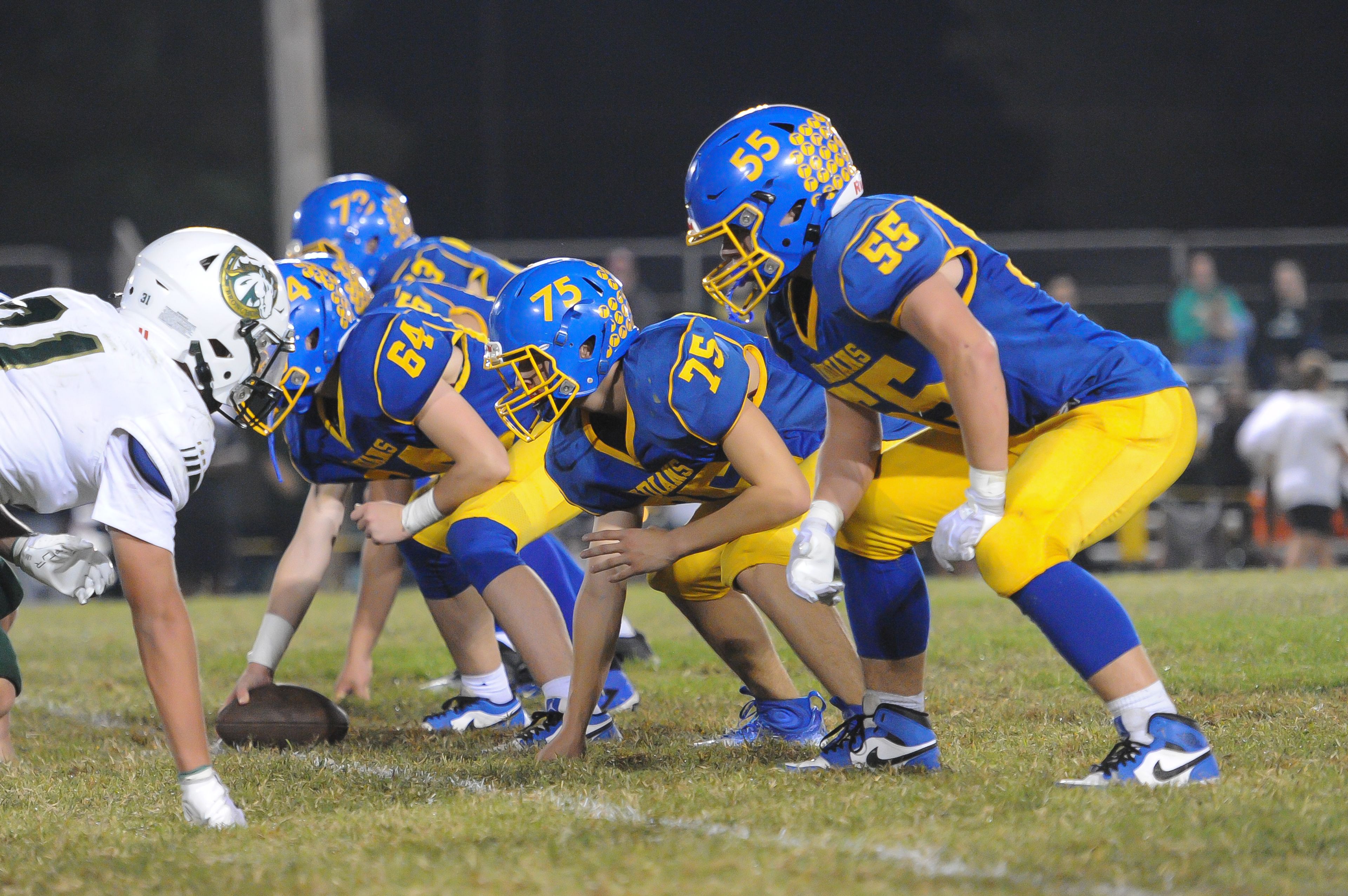 St. Vincent's Gavin Hotop (right) prepares for the snap during a Friday, October 4, 2024 game between the St. Vincent Indians and the Bayless Bronchos at St. Vincent High School in Perryville, Mo. St. Vincent defeated Bayless, 56-21.