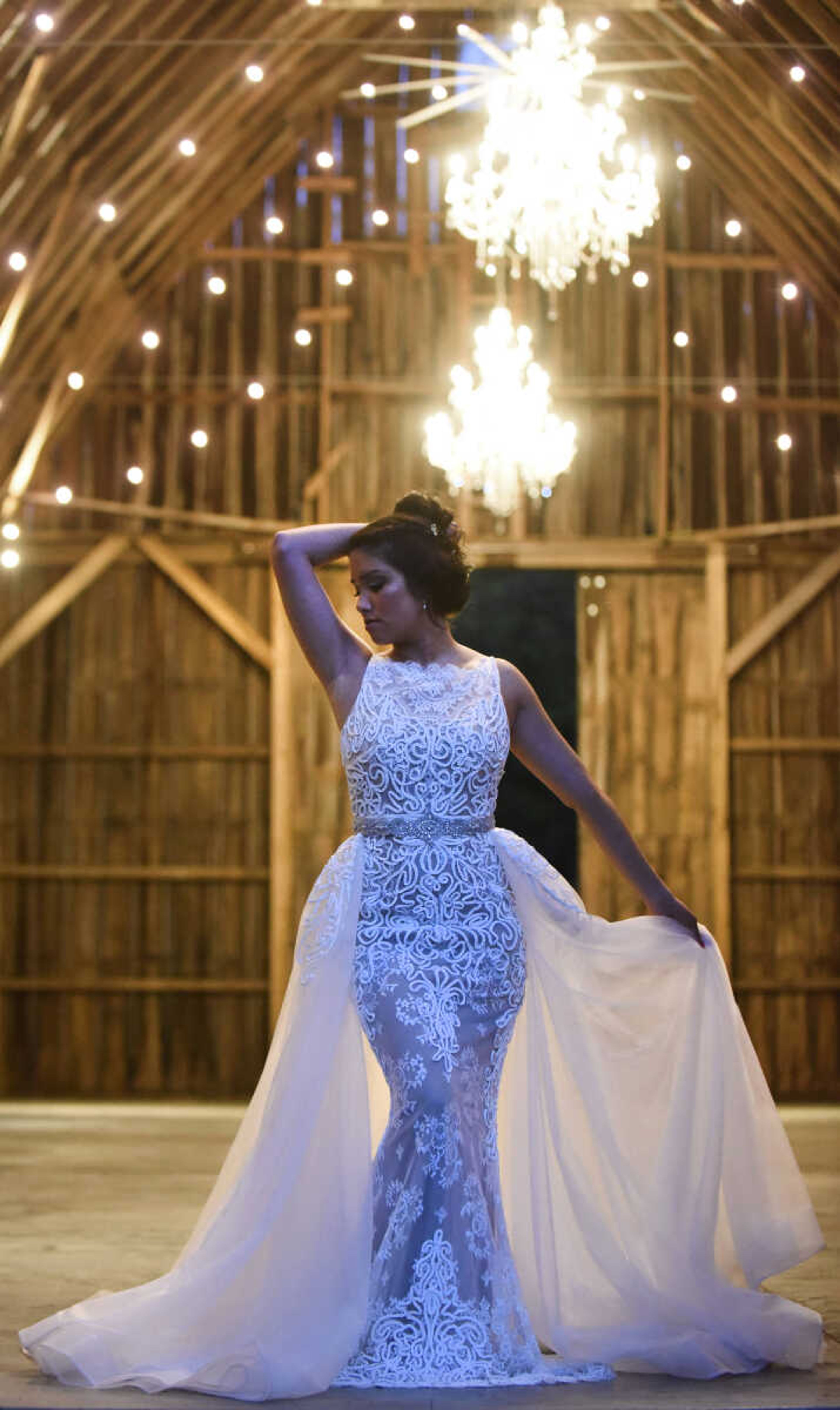 Sherri Hill gown with braiding embellishment and neutral undertone with a "bling!" belt and Jim Ball pearl drop earrings. Available at Joy's Bridal in Sikeston, Missouri.