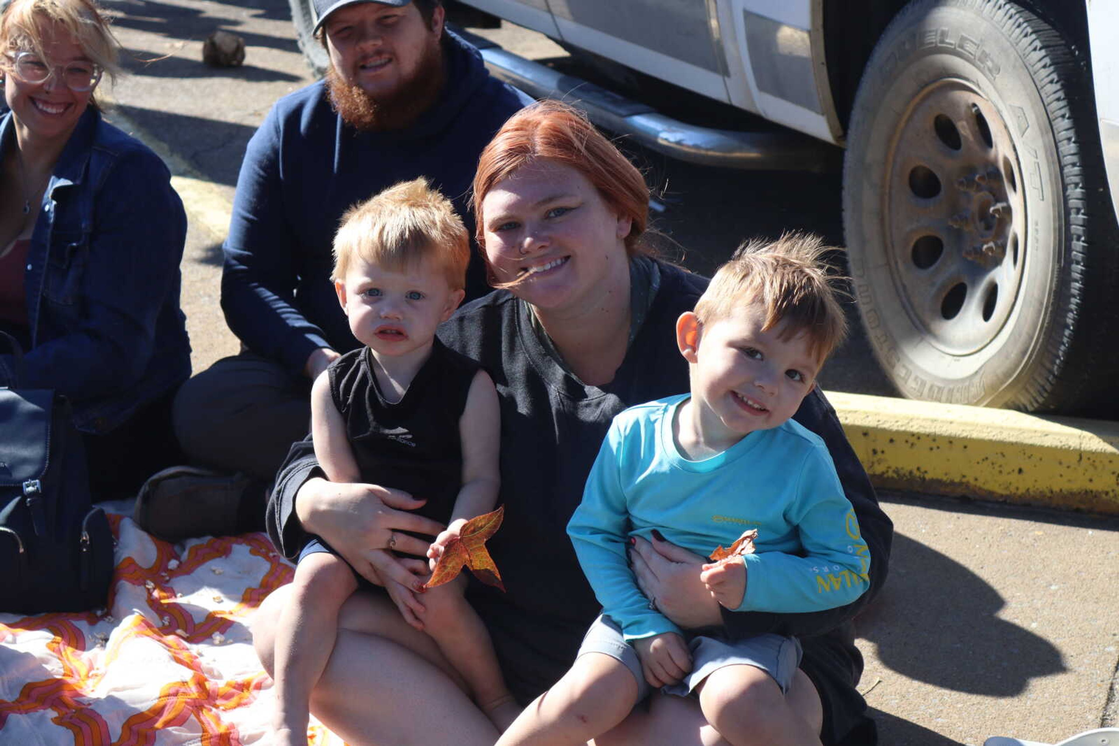 Stevie Williams and her boys smile for a photo.