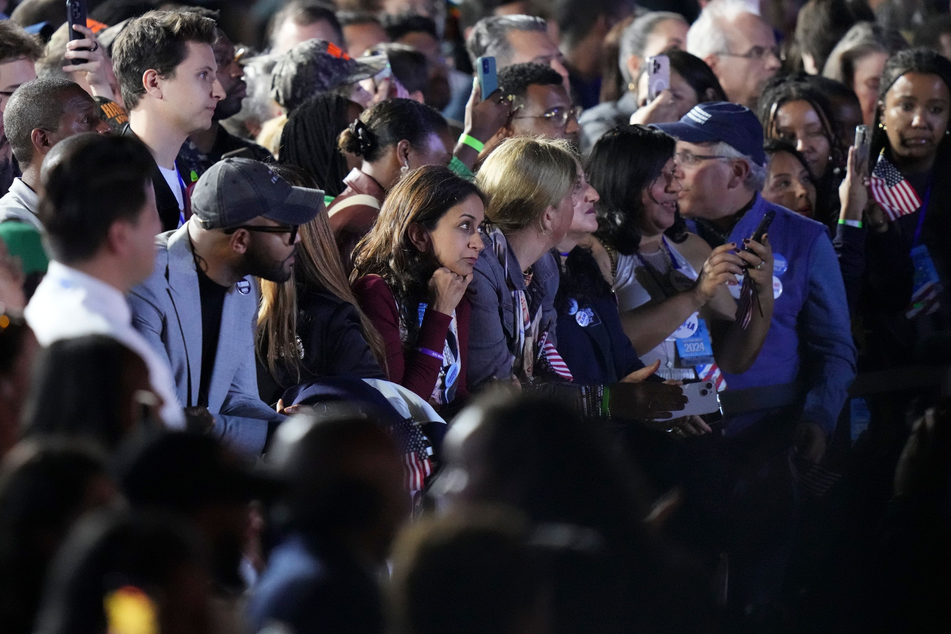 Supporters react after it was announced that Democratic presidential nominee Vice President Kamala Harris would not speak at election night campaign watch party on Wednesday, Nov. 6, 2024, on the campus of Howard University in Washington. (AP Photo/Stephanie Scarbrough)