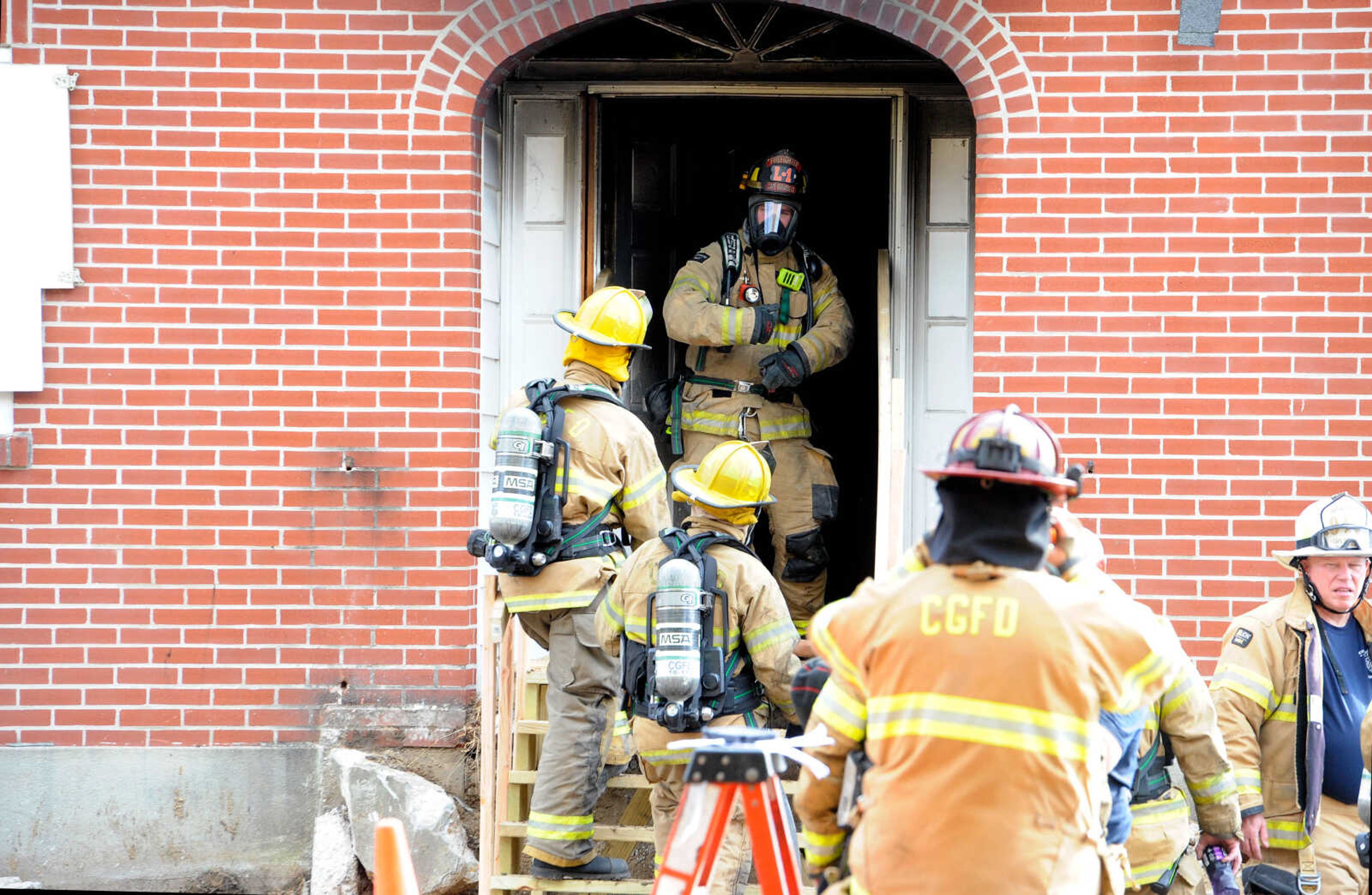 First- and second-year fire fighters pile in to 222 N. Middle St. for the live burn exercise held by the Cape Girardeau Fire Department on Friday, Oct. 23, 2020.&nbsp;