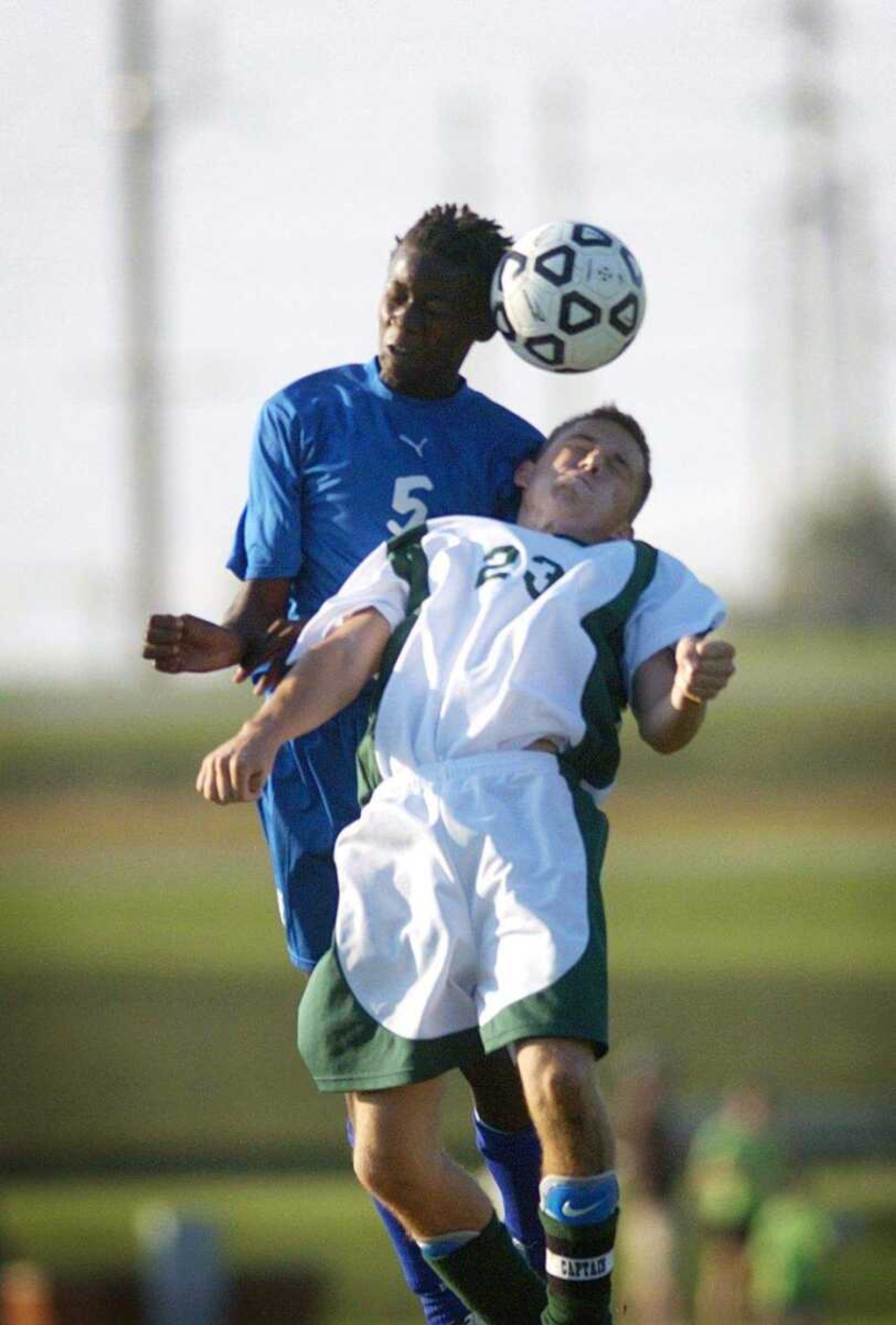 CHUCK WU ~ cwu@semissourian.com
Notre Dame player Ke-Ke Kellum and Perryville's Dalton Hoehn leaping in the air fights for a header.