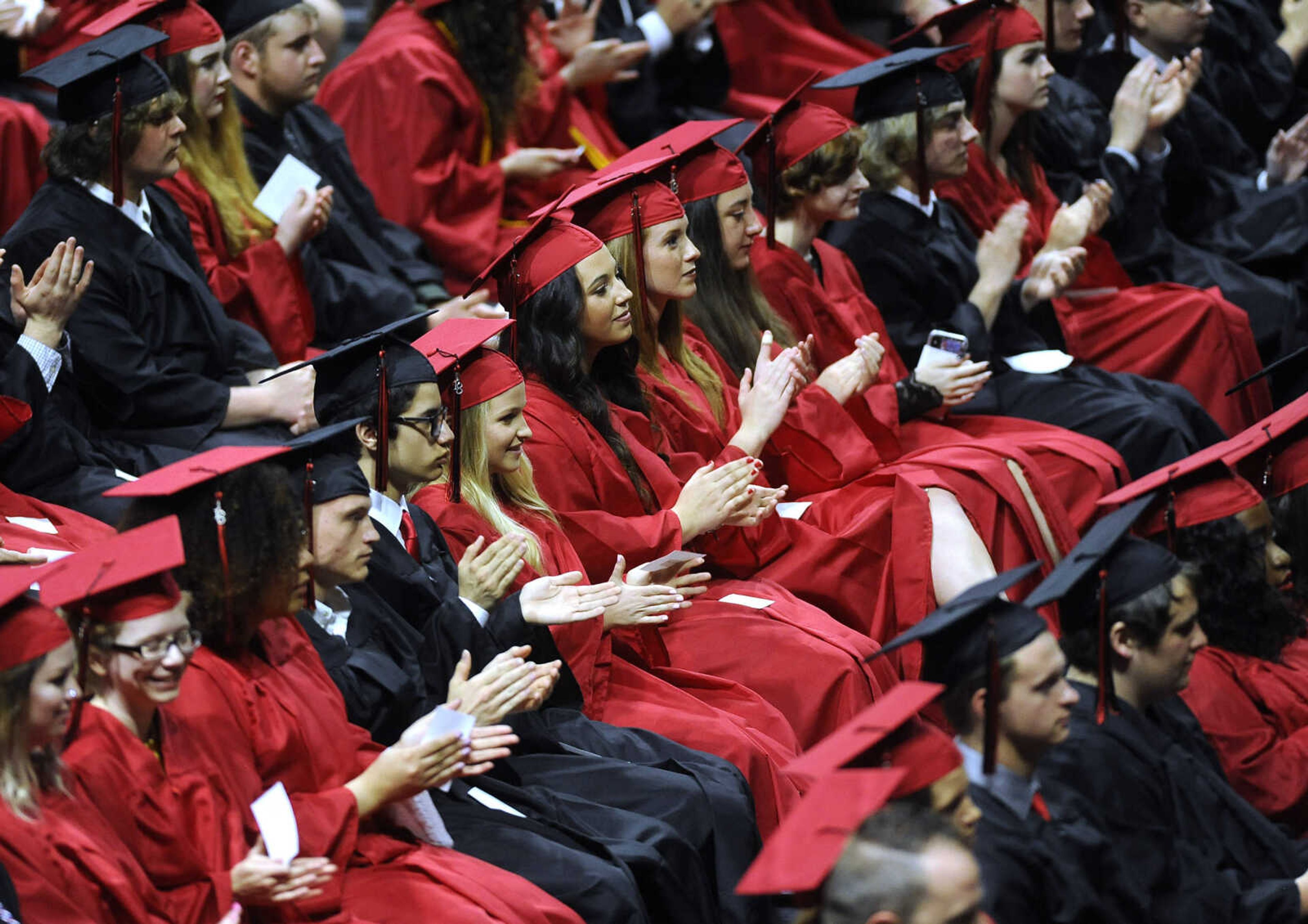 FRED LYNCH ~ flynch@semissourian.com
Jackson High School graduates applaud during the commencement Friday, May 18, 2018 at the Show Me Center.