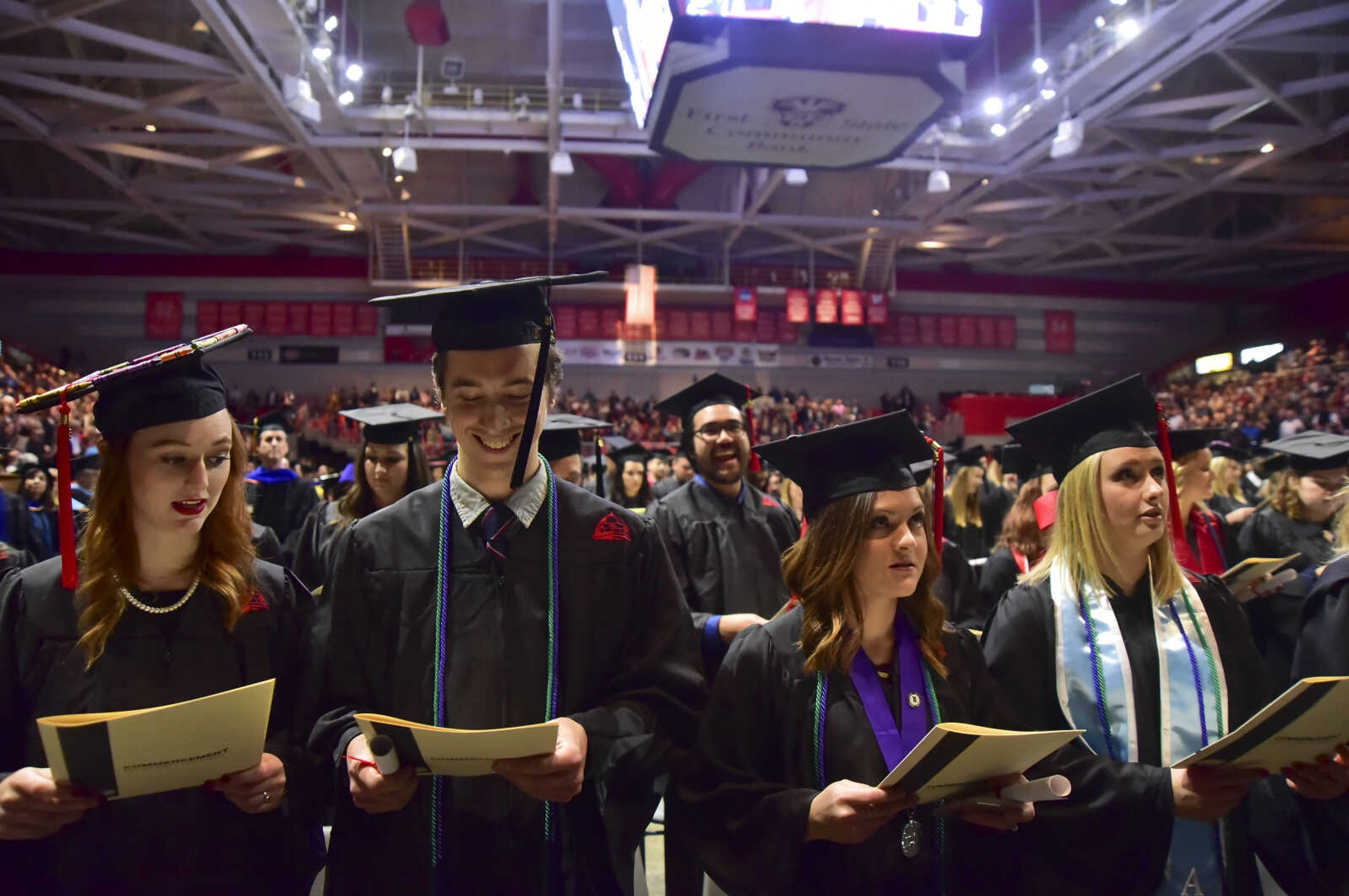 ANDREW J. WHITAKER ~ awhitaker@semissourian.com
Students sing the Alma Mater during Southeast Missouri State University graduation Saturday, Dec. 17, 2016 at the Show Me Center in Cape Girardeau.