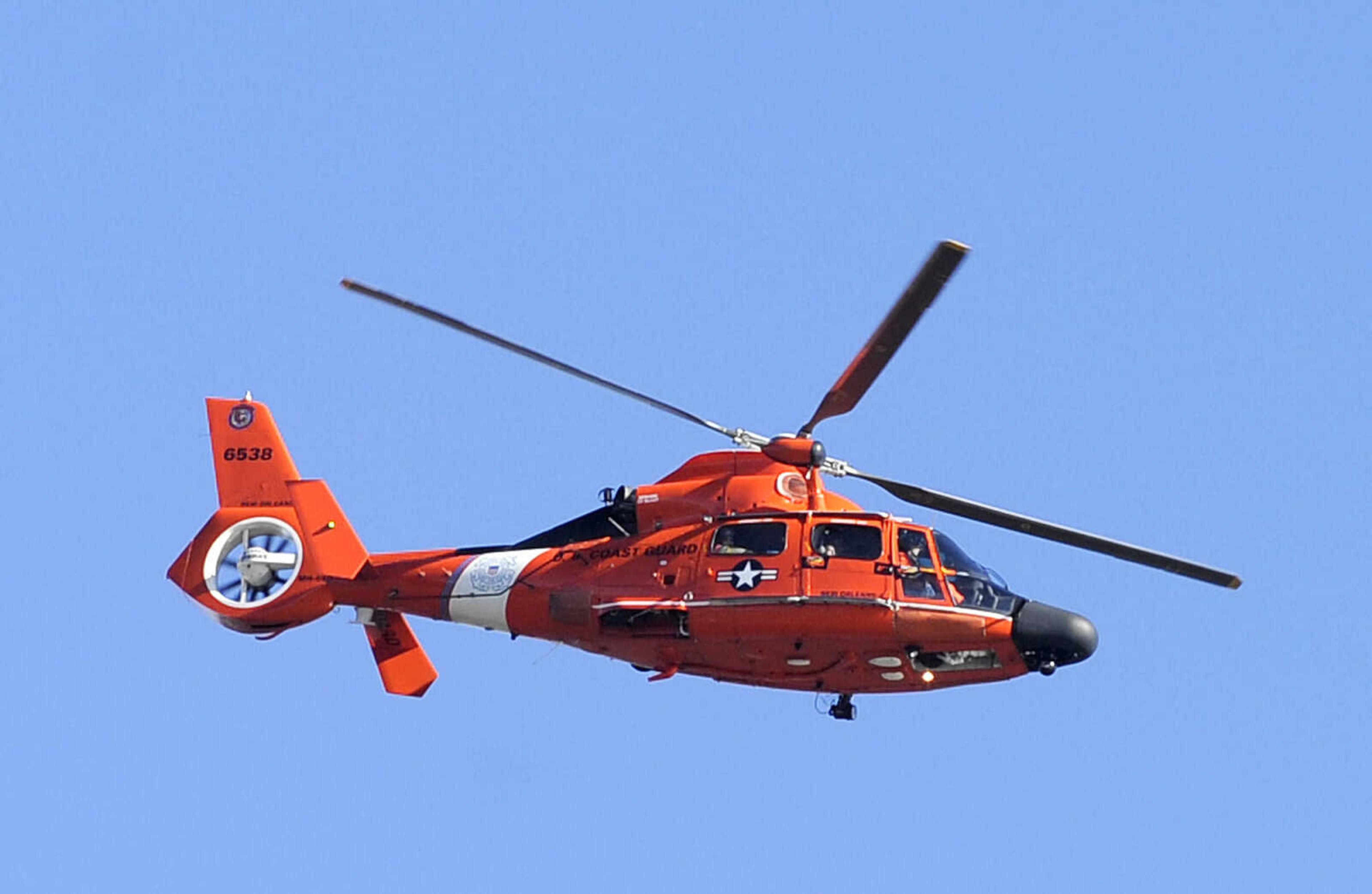 LAURA SIMON ~ lsimon@semissourian.com

A U.S. Coast Guard helicopter flies over the swollen Mississippi River, Saturday, Jan. 2, 2016, in Cape Girardeau.