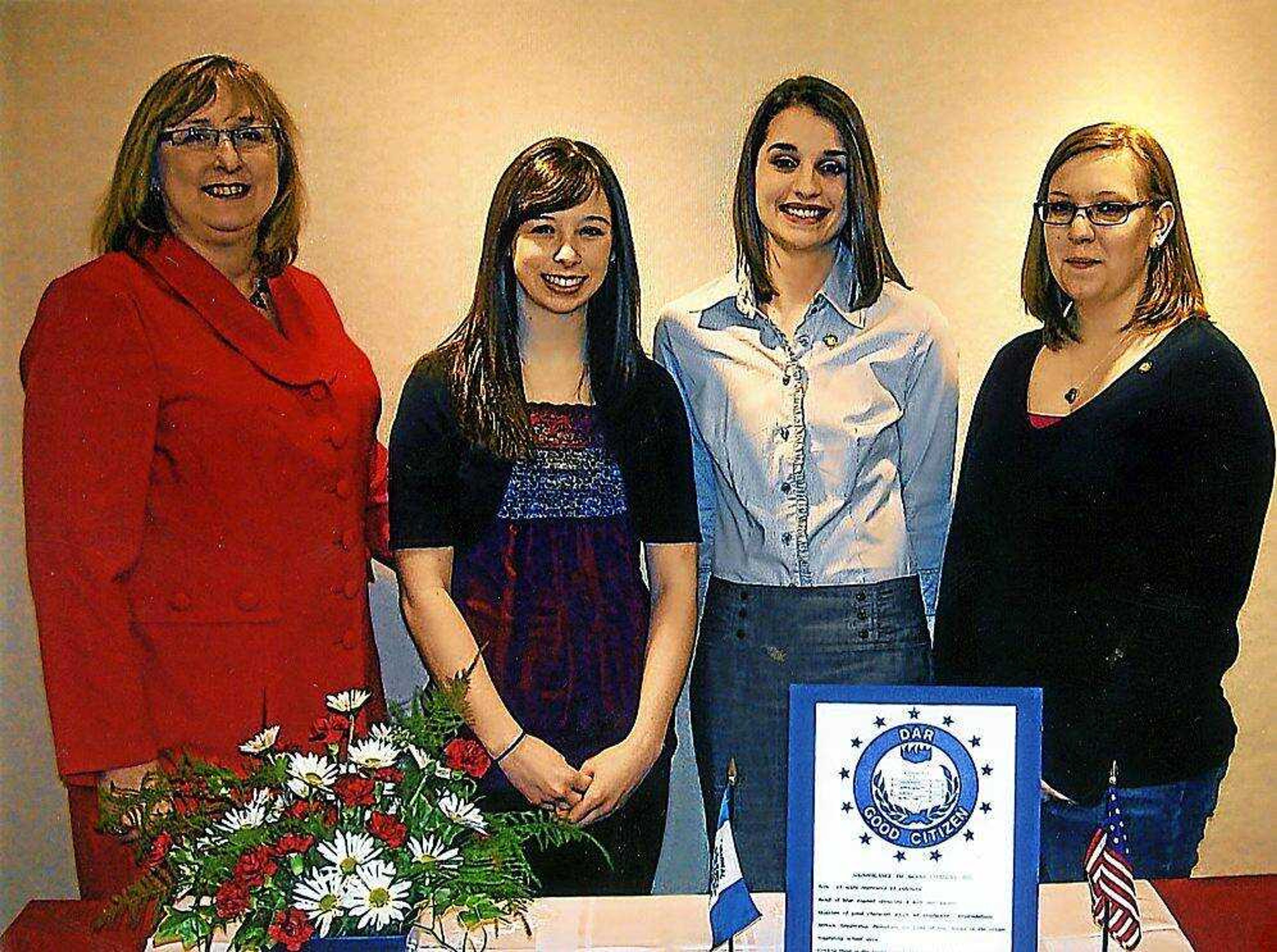 From left are Nancy Hunter Chapter regent Shelia Holloway, Randi Wiley, Hillary Caldwell and Breanna McClellan. (Submitted photo)