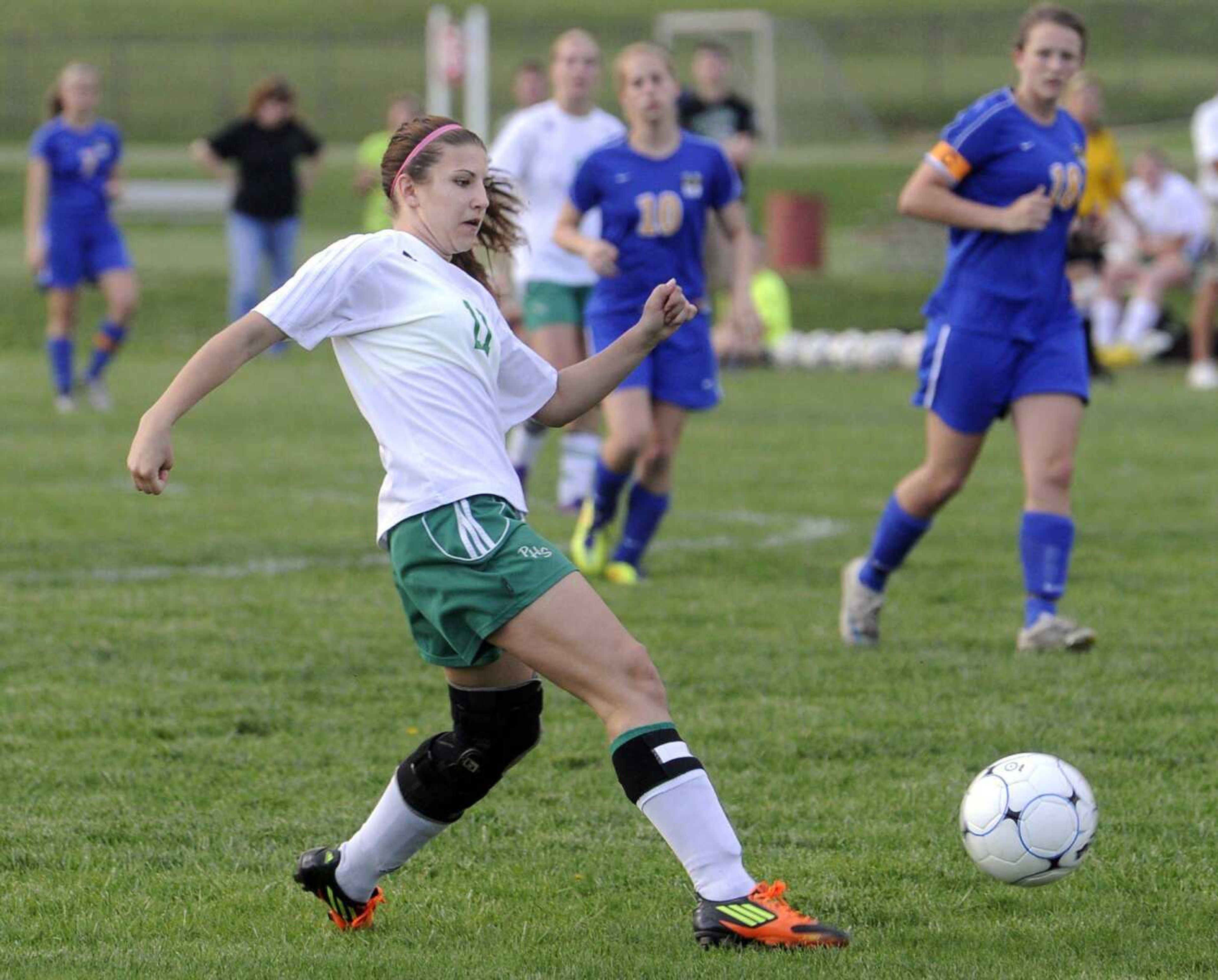 Perryville's Courtney Borden kicks the ball against Seckman on Friday.