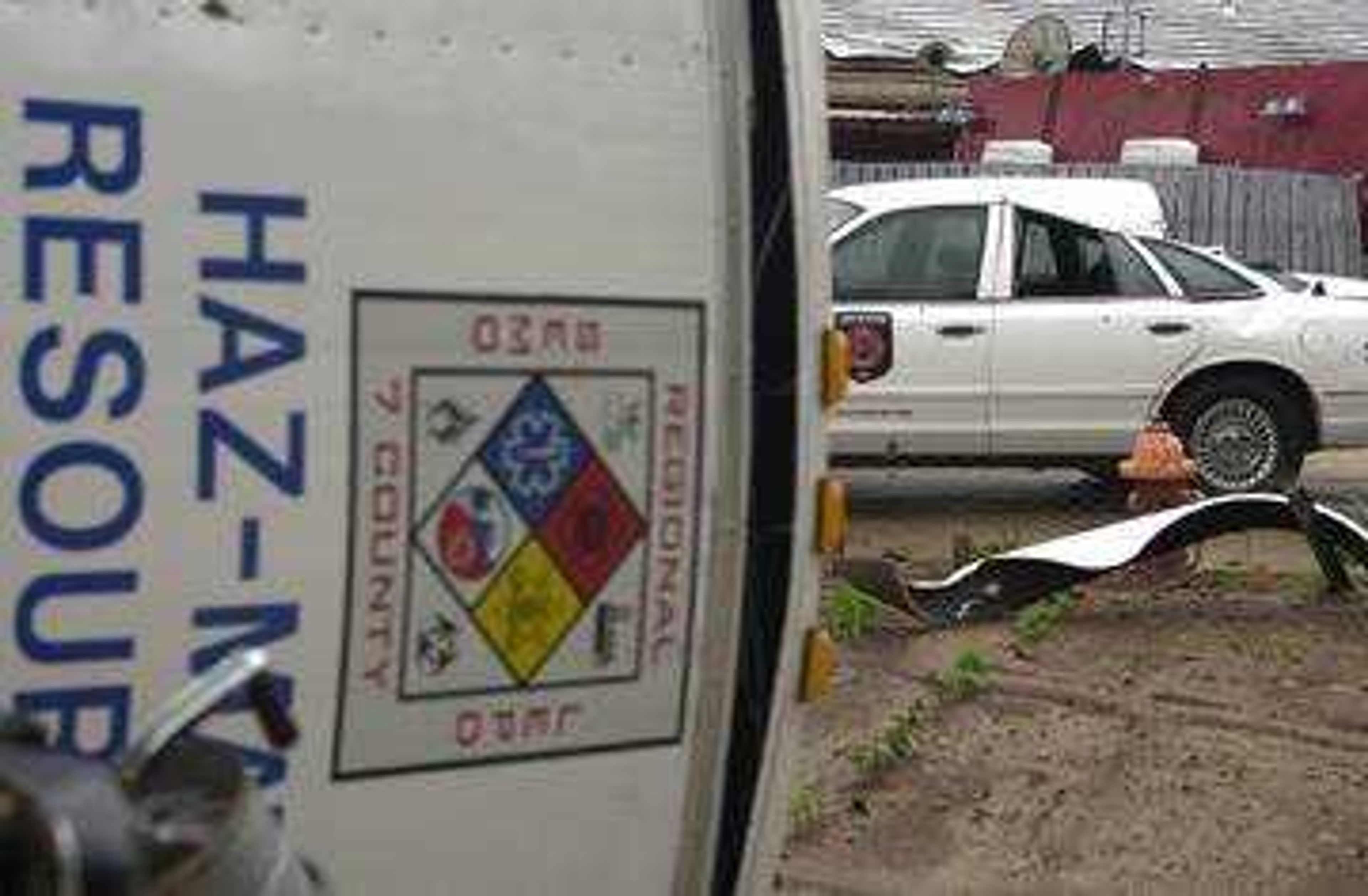 Winds pummeled Jackson last night, shoving the fire chief's car in to a flipped Hazardous Materials trailer.