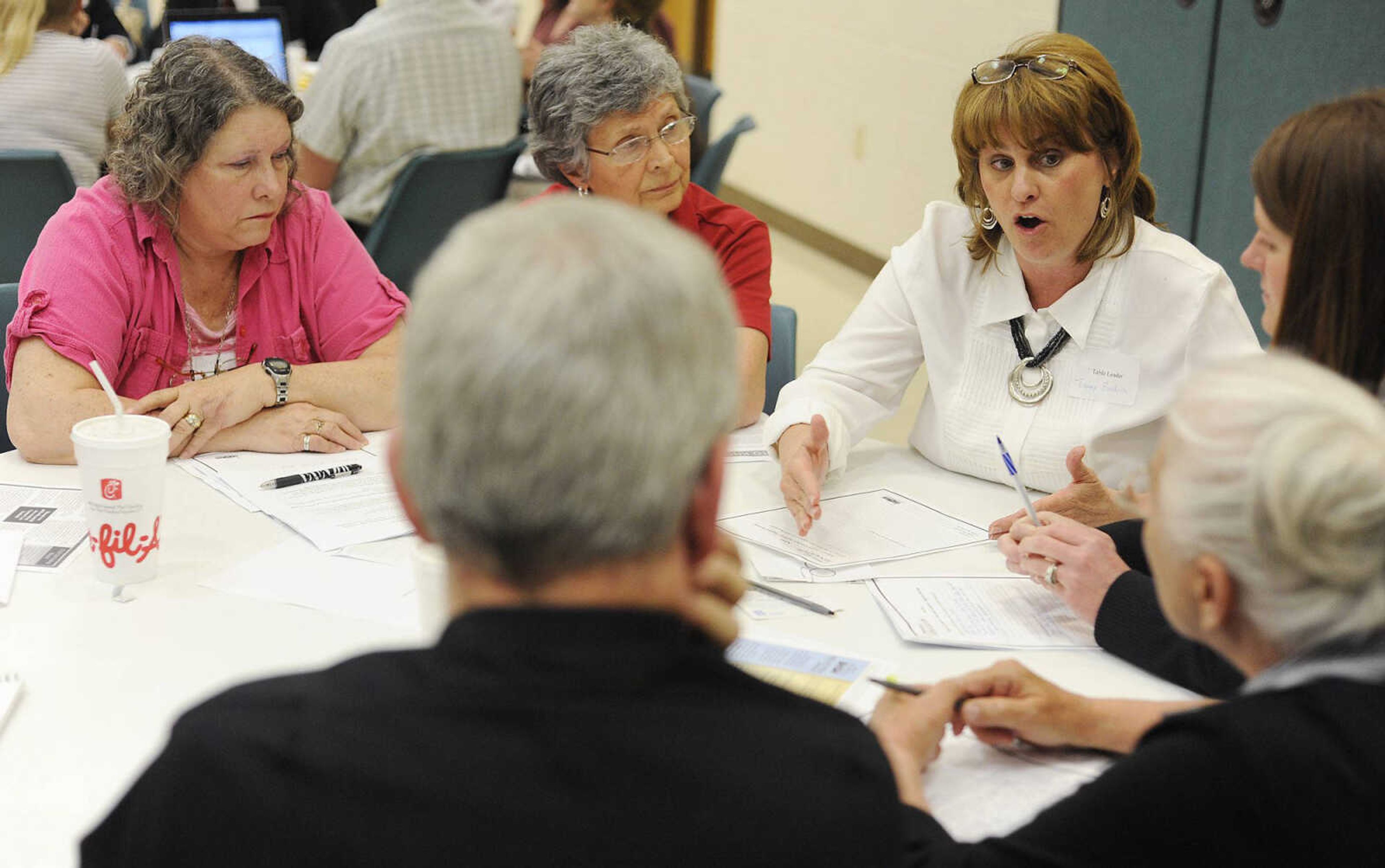 Tammy Brotherton, of Jackson, speaks during the table discussion period of an informational meeting about the Common Core State Standards hosted by the Missouri Department of Elementary and Secondary Education, Thursday, May 2, at the Career and Technology Center in Cape Girardeau. The Common Core State Standards are the result of a state led initiative to adopt common standards from state to state. (Adam Vogler)