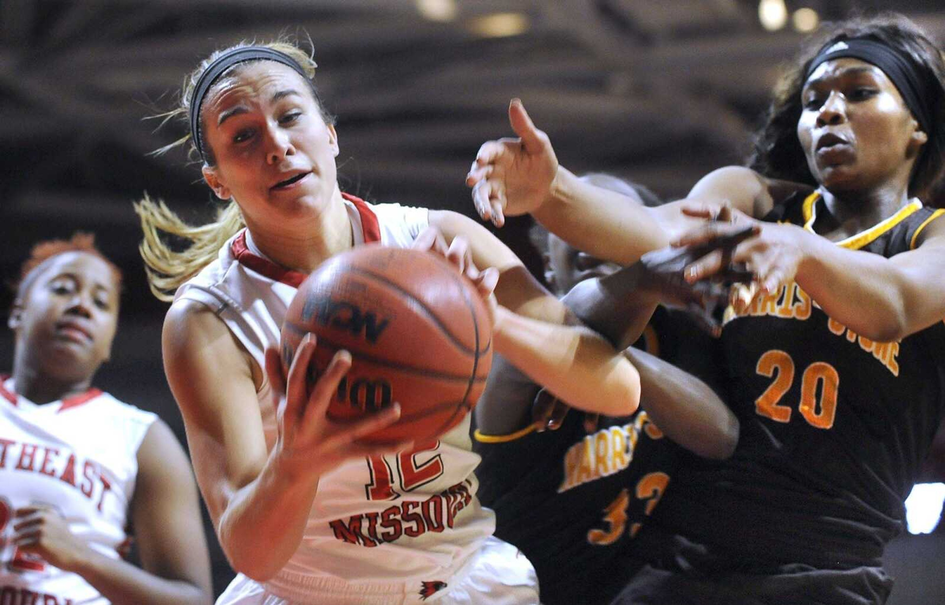 Southeast Missouri State's Erin Bollmann drives past Harris-Stowe's Shaakera Jones during the fourth quarter Monday at the Show Me Center. (Fred Lynch)