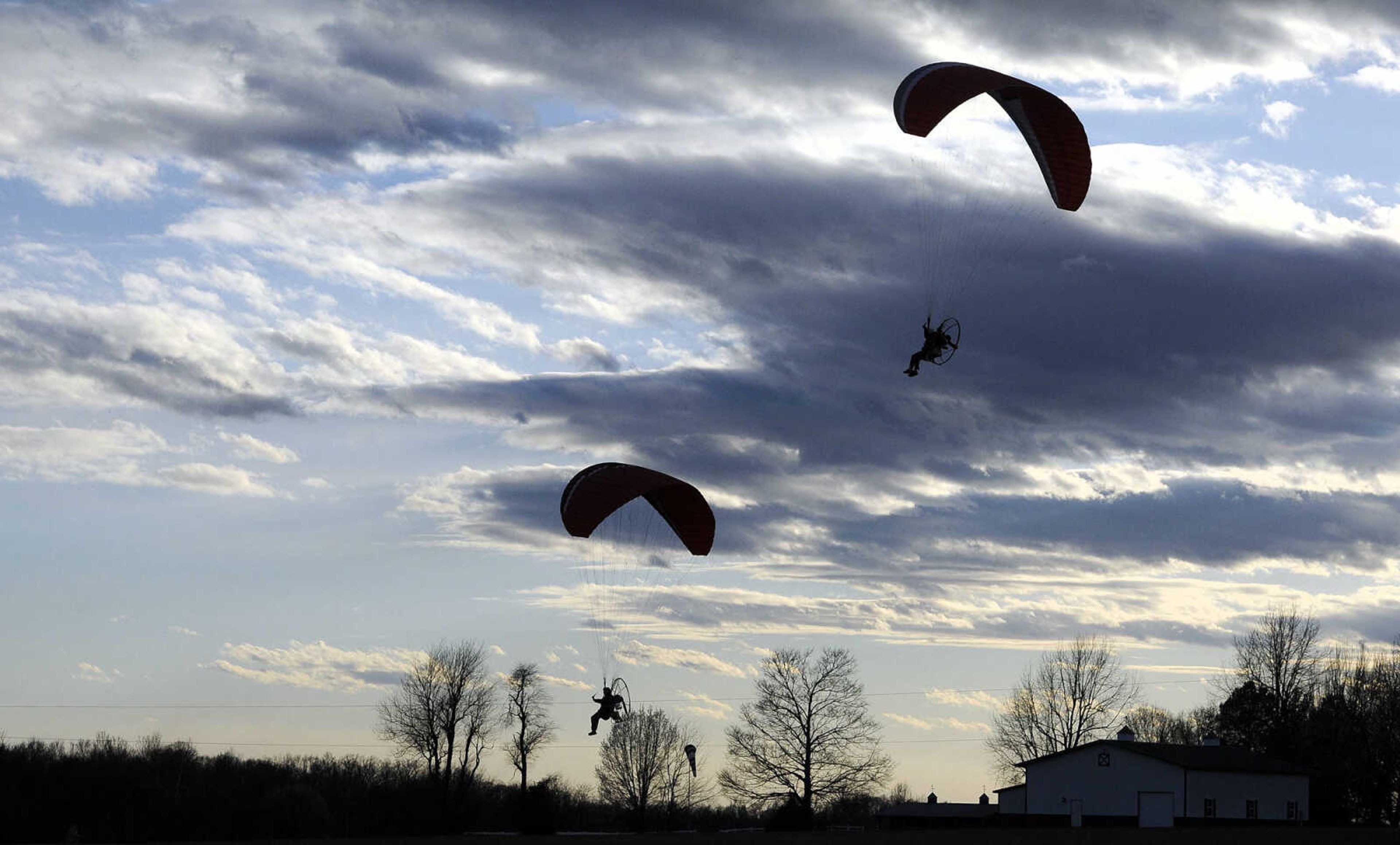 Dave Bogenpohl and Curt Froemsdorf soar across the sky on Thursday, March 2, 2017, at the Fruitland International Airport in Jackson.