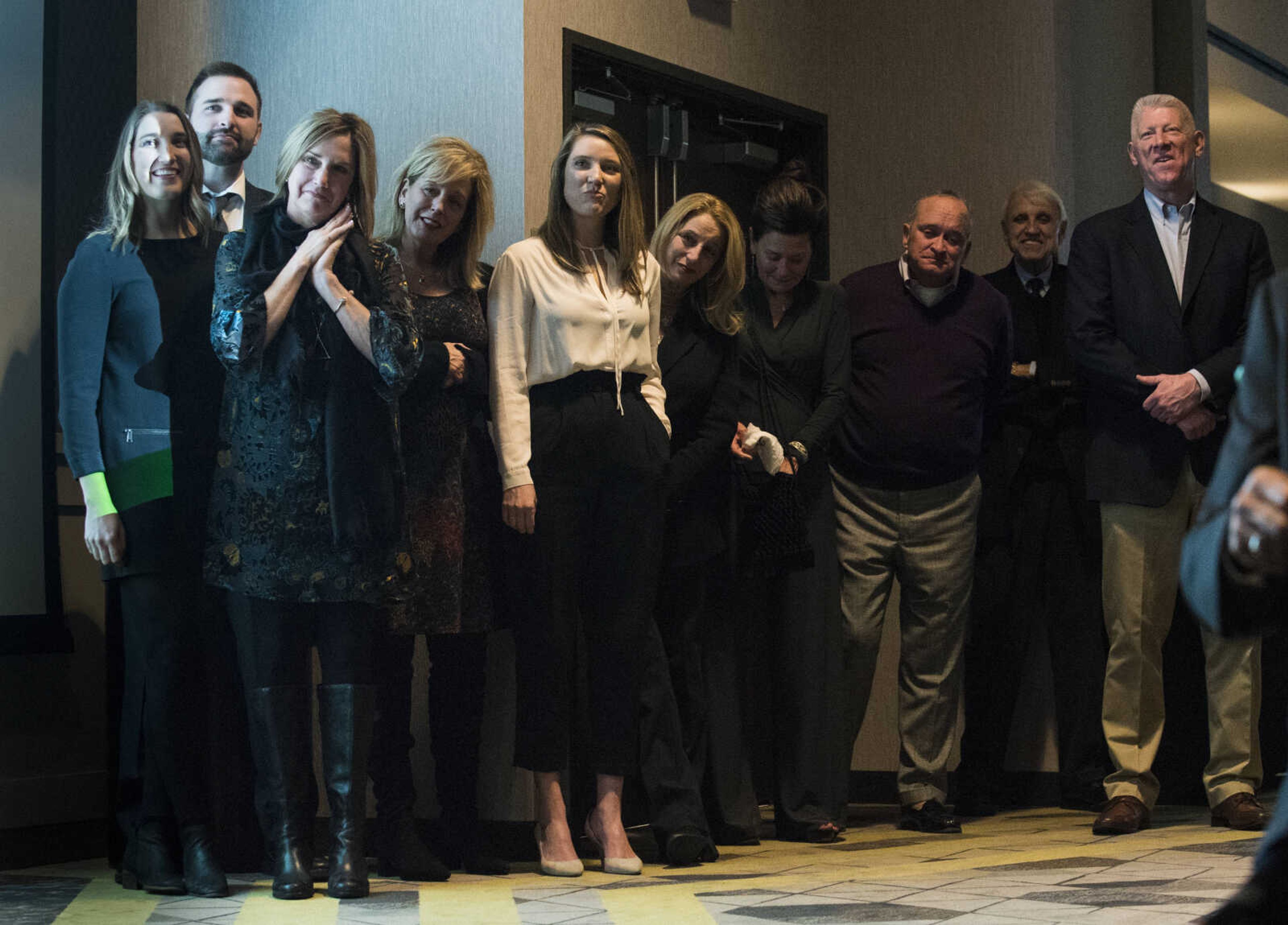 Family members listen from the side as Bob Neff accepts the Rush H. Limbaugh Award at the Cape Girardeau Area Chamber of Commerce's annual dinner held Jan. 26, 2018, at the Drury Plaza Conference Center in Cape Girardeau.