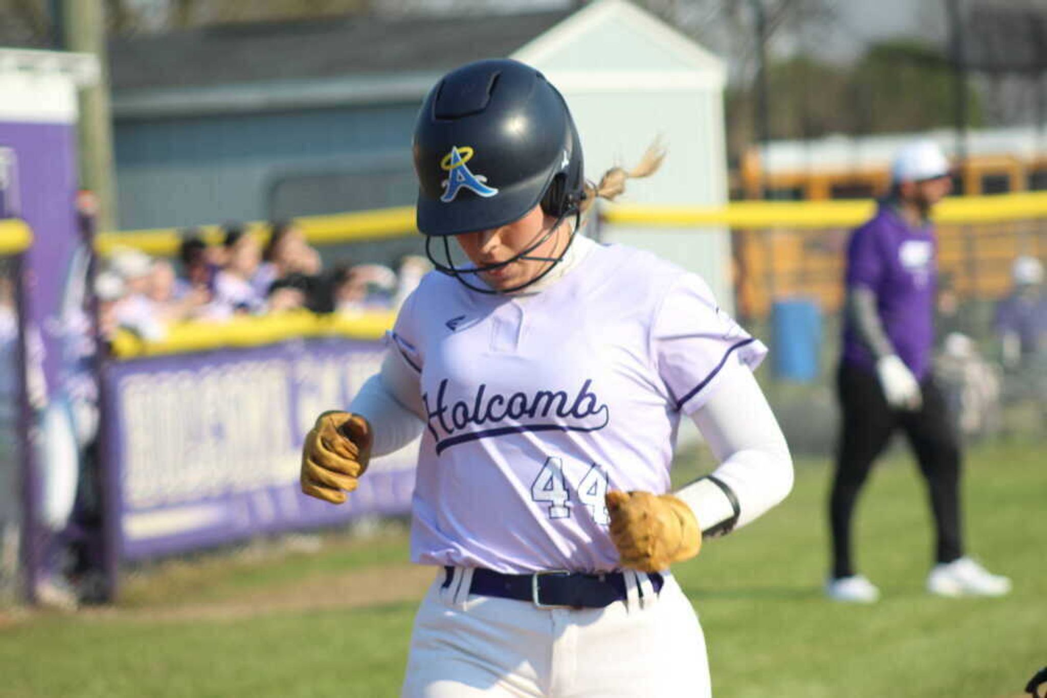 Holcomb's Maleigh Lemings crosses home plate at a regular season match against the South Pemiscot Lady Bulldogs.
