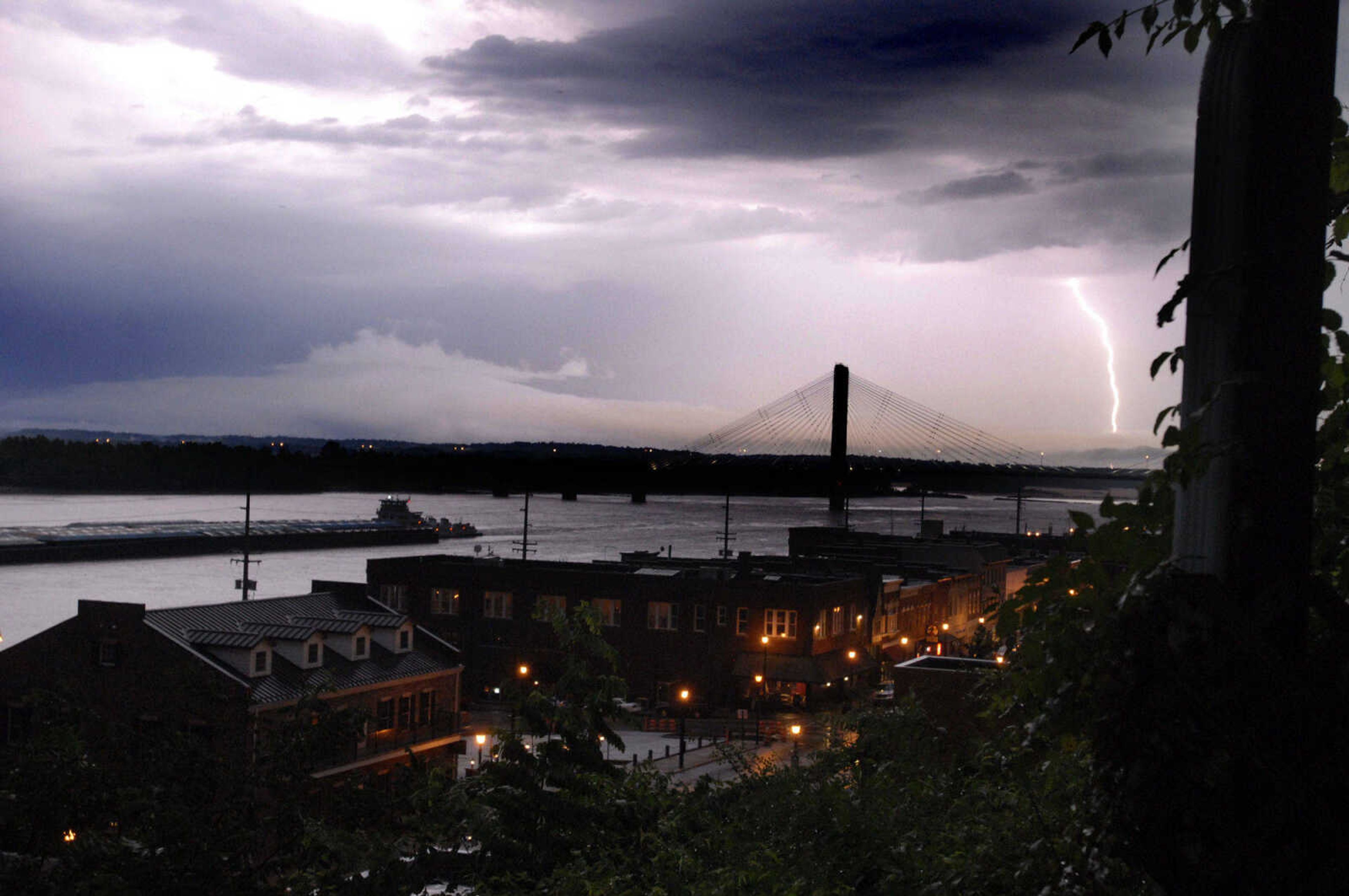 ELIZABETH DODD ~ edodd@semissourian.com
Lightning lights up the entire sky over downtown Cape Girardeau at 9:30 p.m. during Tuesday night storms.