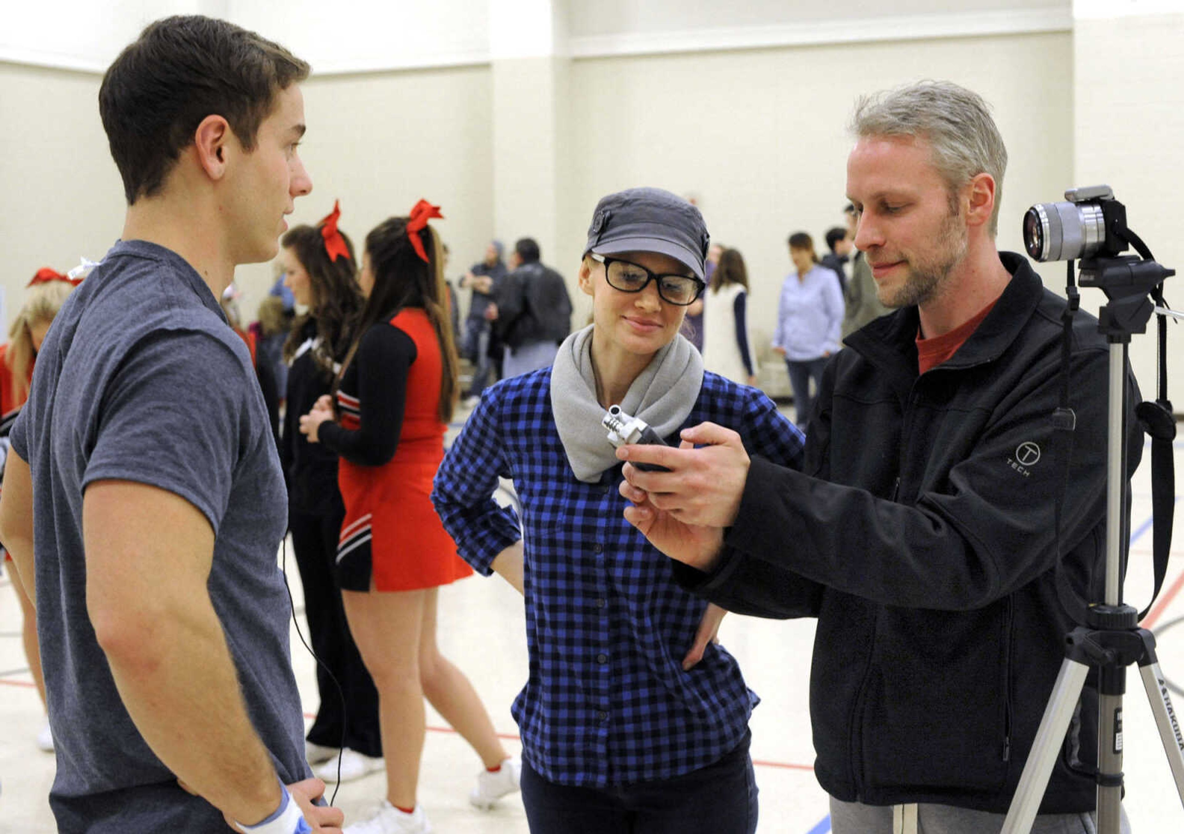 FRED LYNCH ~ flynch@semissourian.com
Adam Rookard, left, works with interviewer Jessica Ambuehl and videographer Keith Nussbaum for the movie, "Love Chronicles (of the Cape)" on Sunday, Jan. 11, 2015 at Shawnee Park Center in Cape Girardeau.