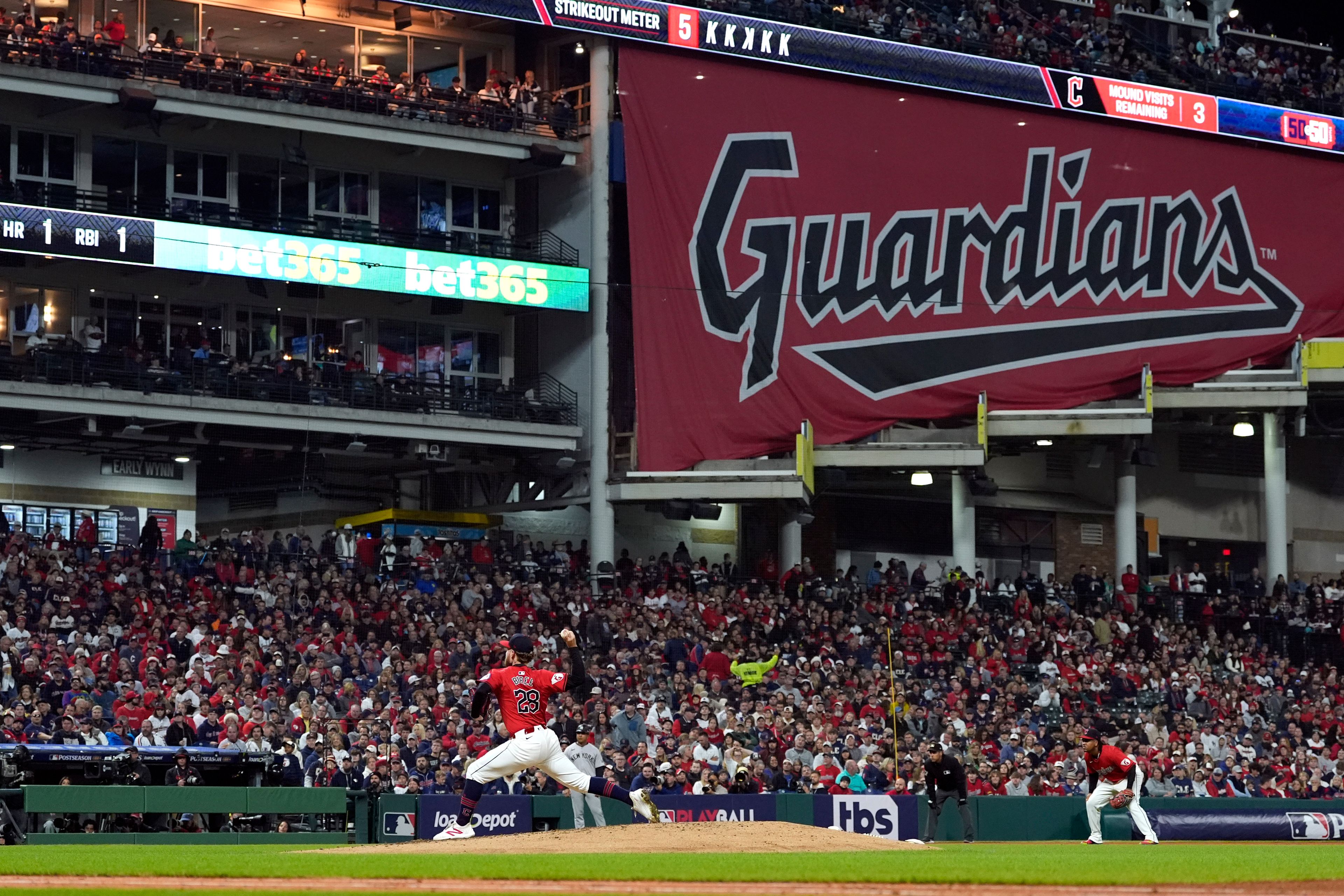 Cleveland Guardians starting pitcher Tanner Bibee (28) throws against the New York Yankees during the fourth inning in Game 5 of the baseball AL Championship Series Saturday, Oct. 19, 2024, in Cleveland. (AP Photo/Godofredo A. Vásquez )