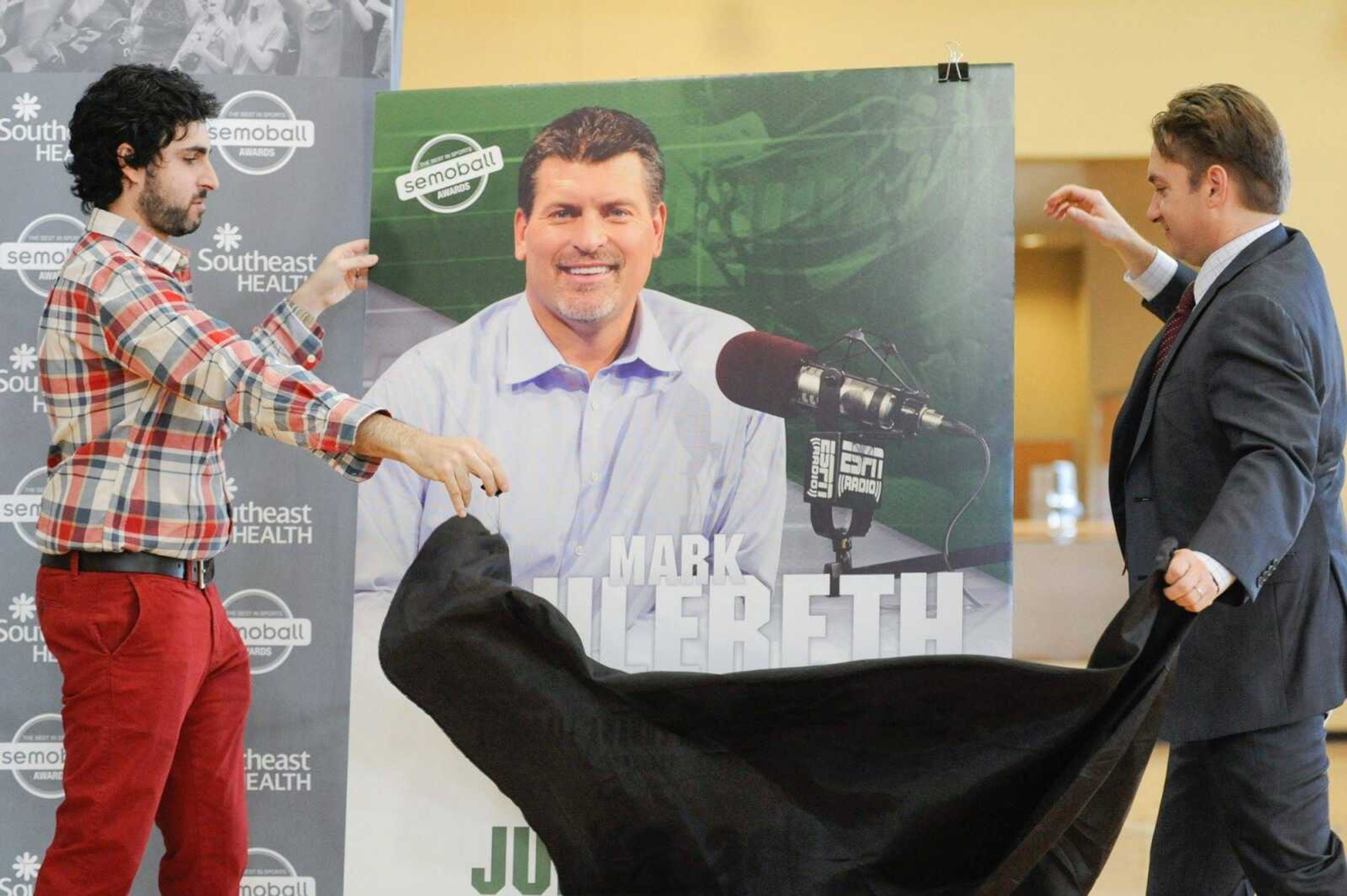 GLENN LANDBERG ~ glandberg@semissourian.com


Southeast Missourian sports editor Josh Mlot and Southeast Missourian publisher Jon Rust unveil the 2016 Semoball Awards speaker at HealthPoint Fitness in Cape Girardeau Wednesday, Feb. 3, 2016.