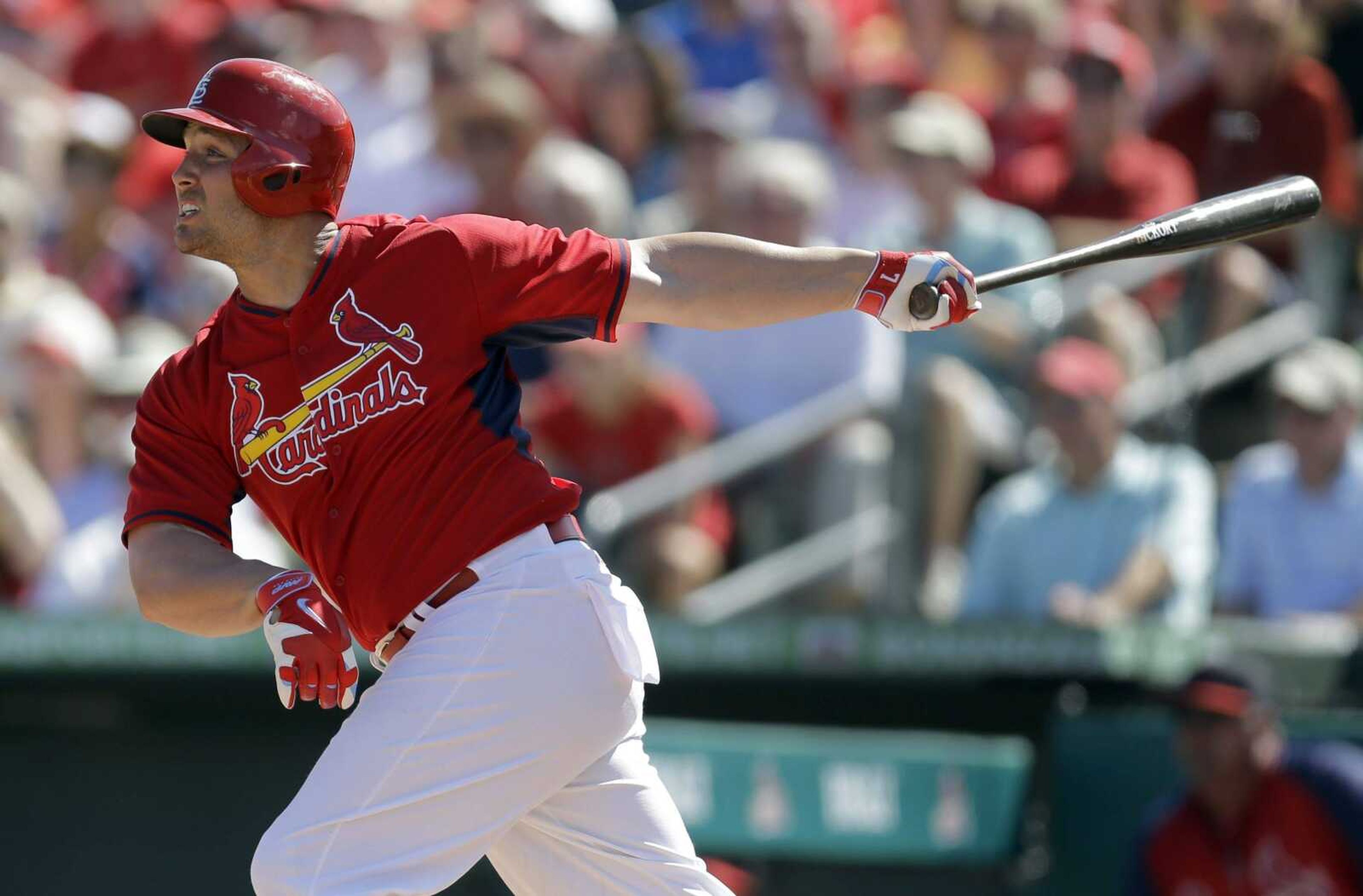 The Cardinals&#8217; Matt Holliday doubles in a run during the third inning of Sunday&#8217;s exhibition game against the Mets in Jupiter, Fla. St. Louis won 7-1. (Jeff Roberson ~ Associated Press)