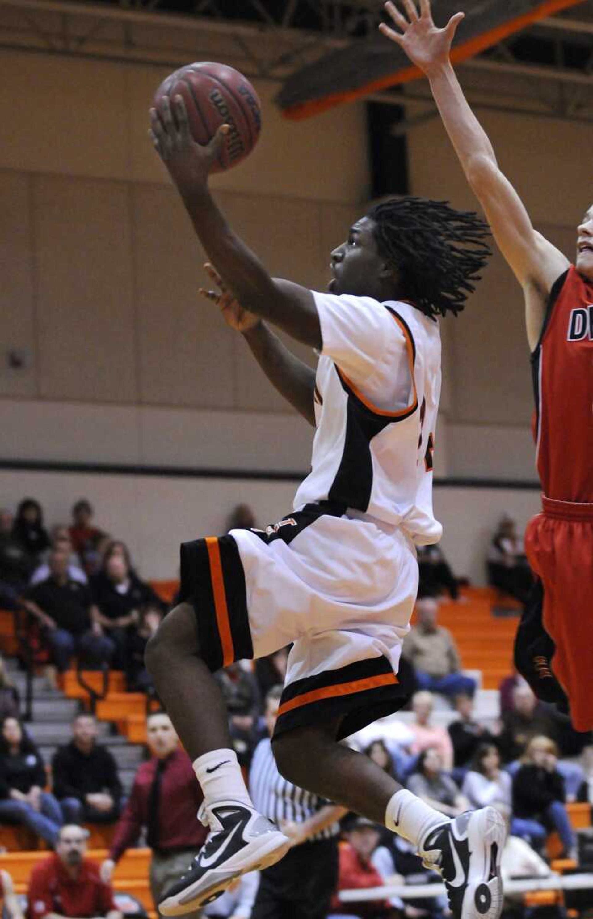 Central's Curtis Branch goes in for a layup during the first quarter Friday. The senior finished with 10 points on senior night.