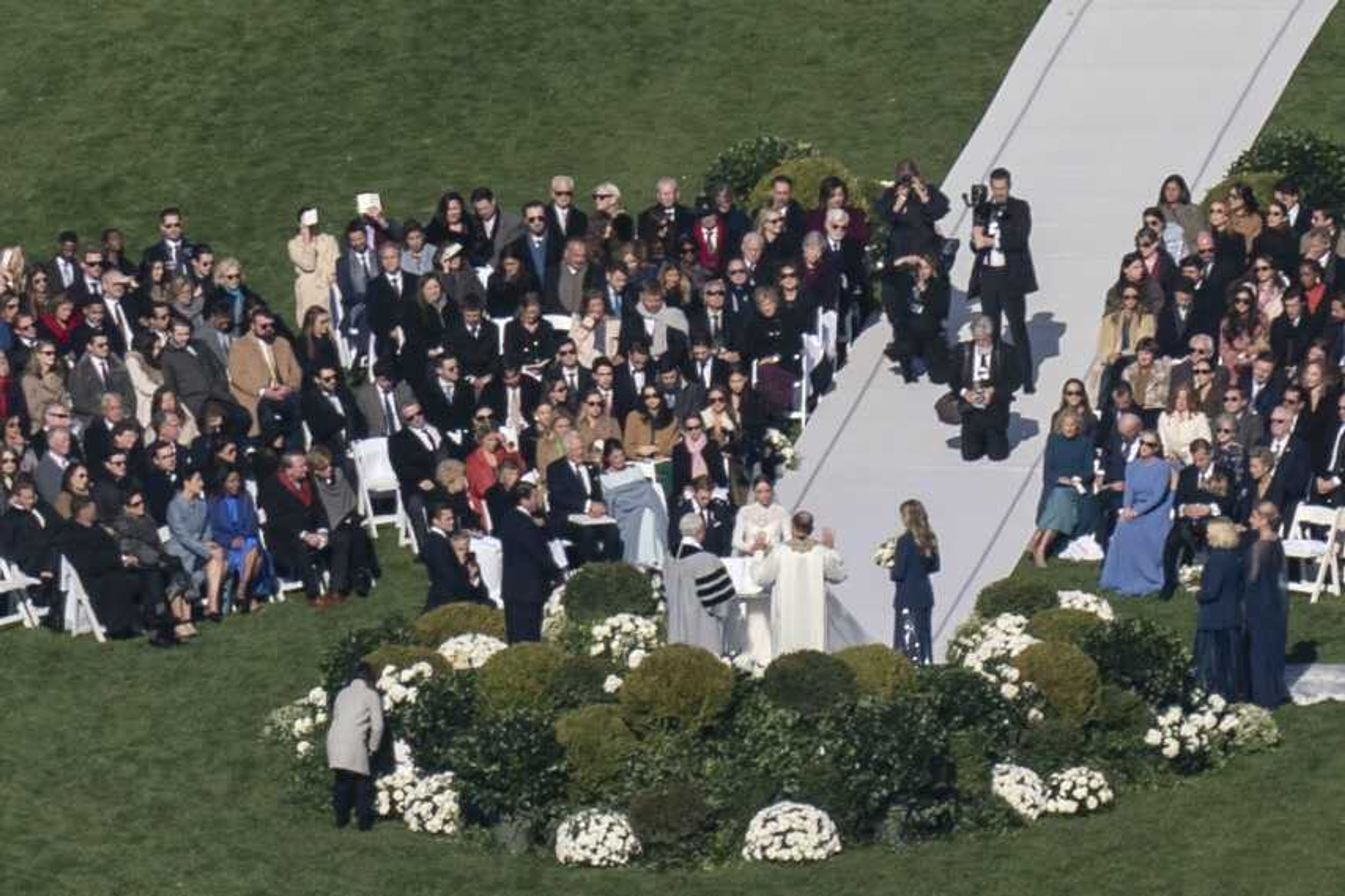 President Joe Biden's granddaughter Naomi Biden and her fiance, Peter Neal, are married on the South Lawn of the White House on Saturday in Washington.