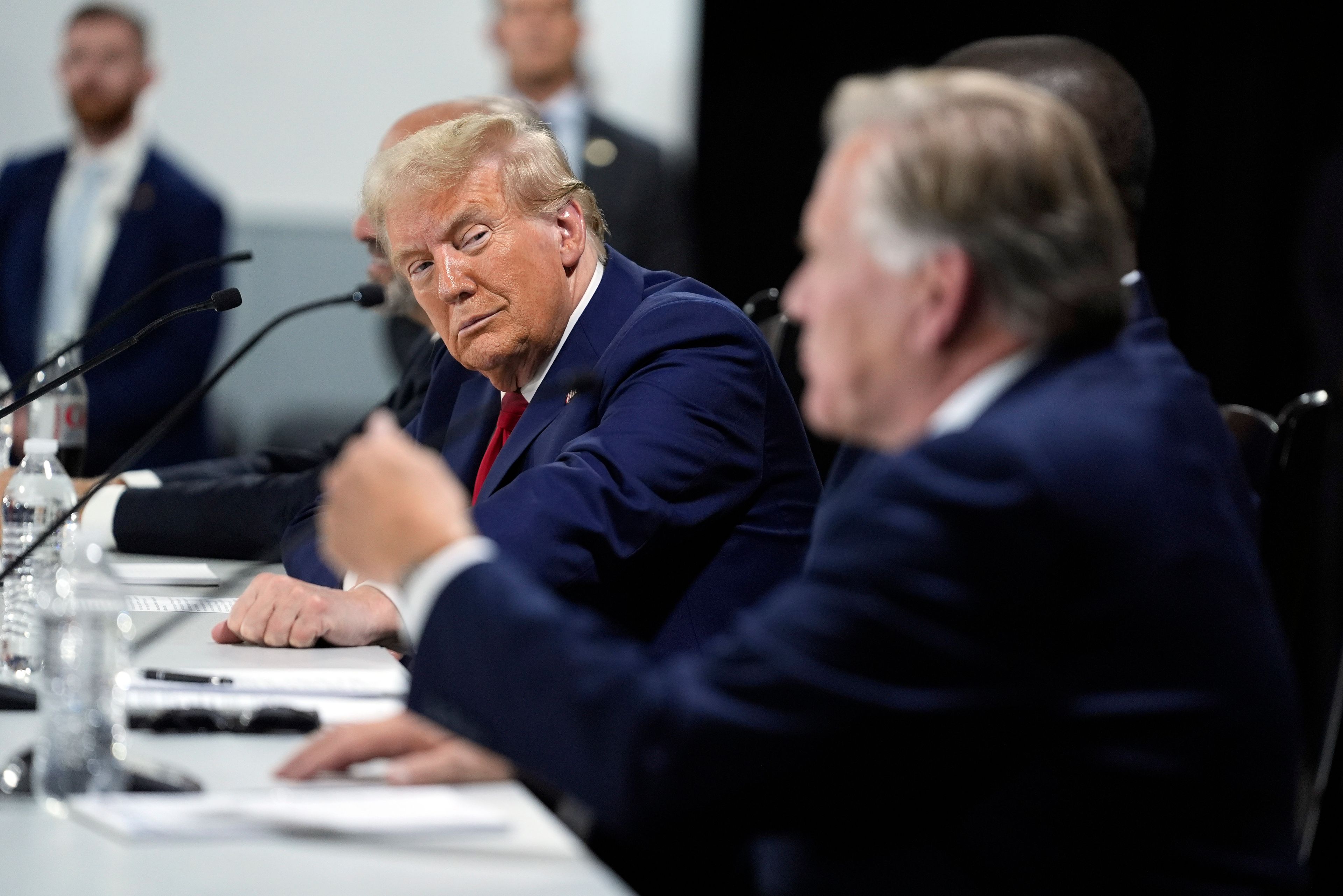 Republican presidential nominee former President Donald Trump listens at a campaign roundtable, Friday, Oct. 18, 2024, in Auburn Hills, Mich. (AP Photo/Evan Vucci)