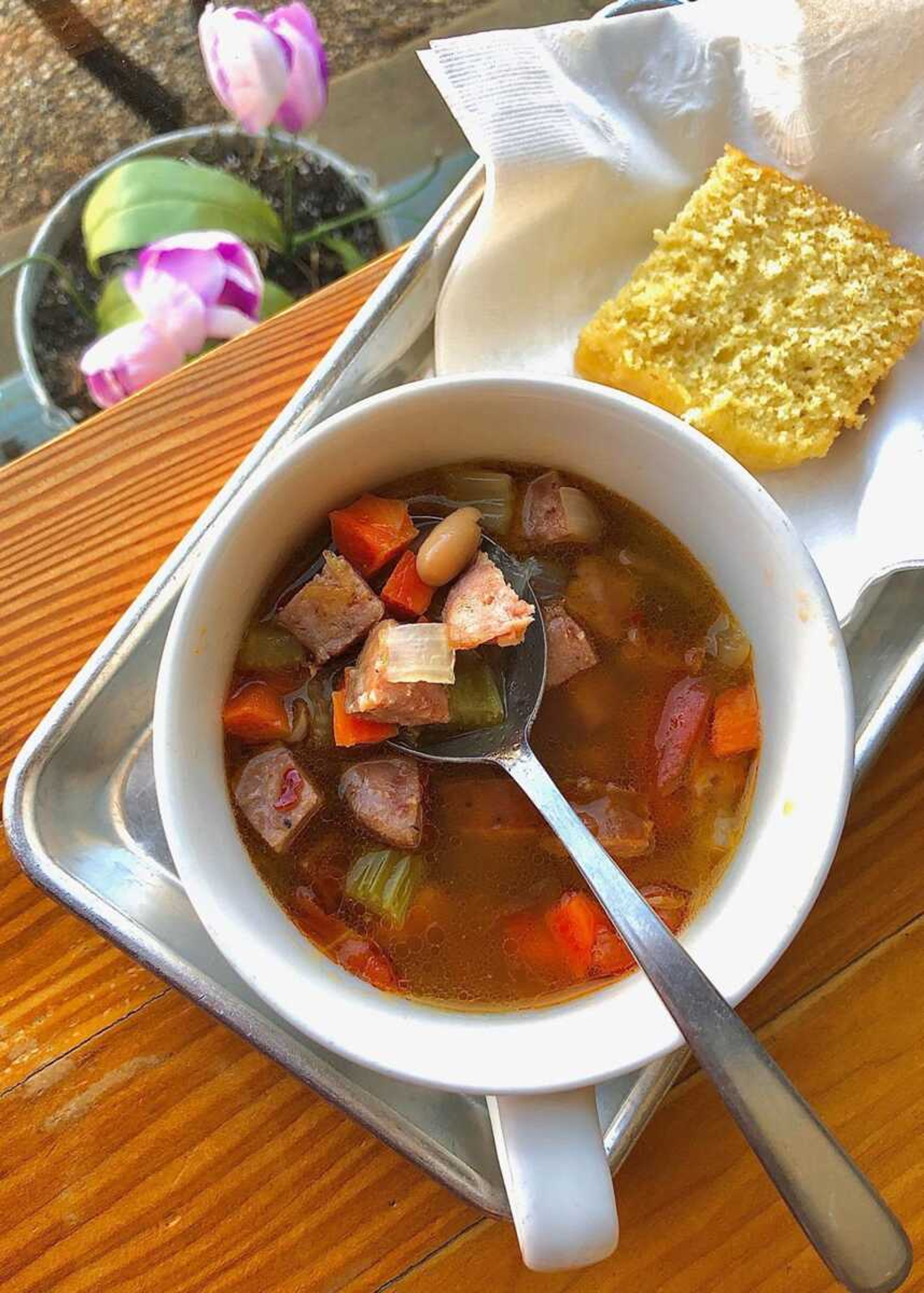 The Kielbasa, bean, and vegetable soup was hearty, smoky, and balanced by the sweetness of the cornbread.