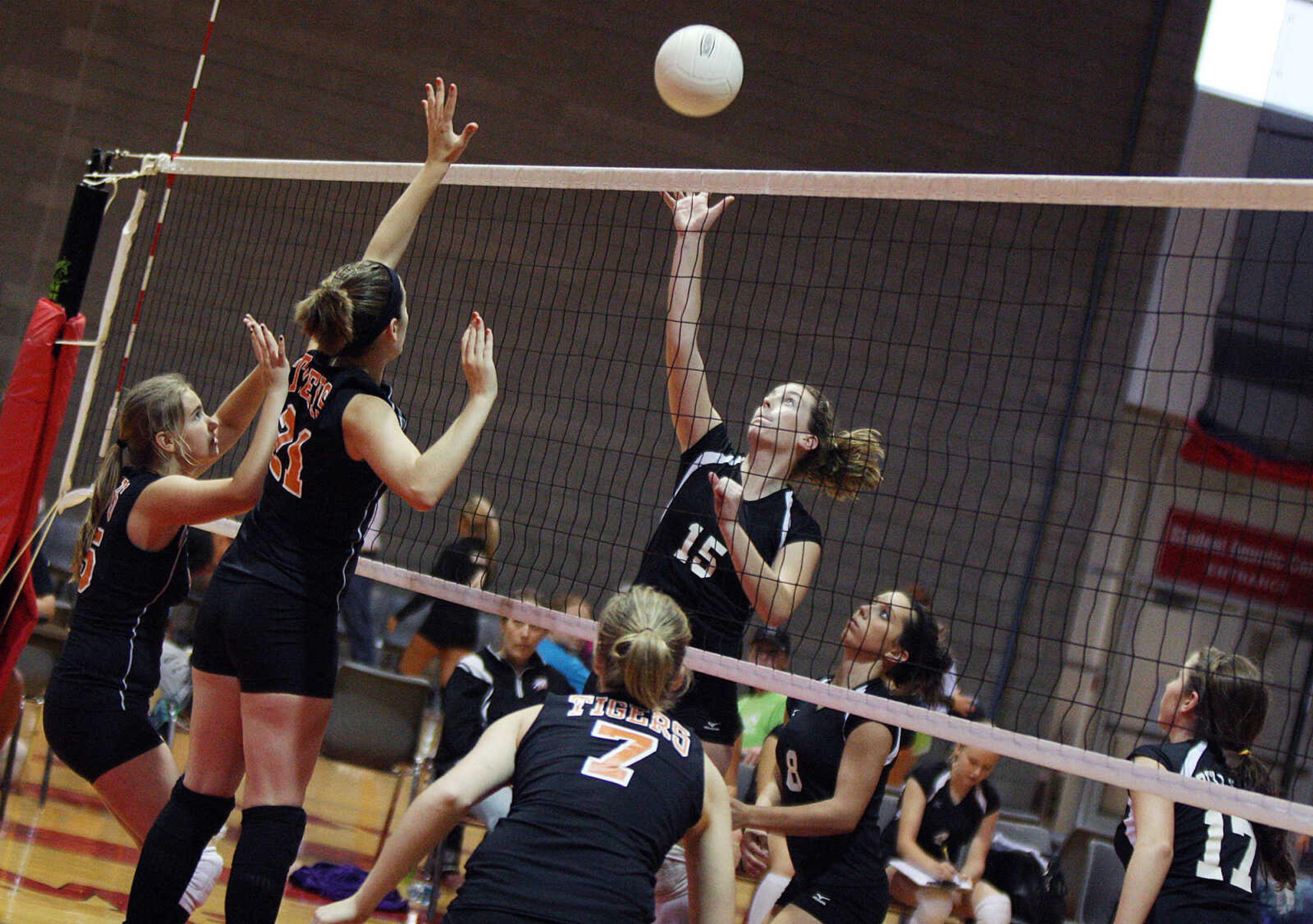 Cape Central, left, and Bell City players go head-to-head for a ball.