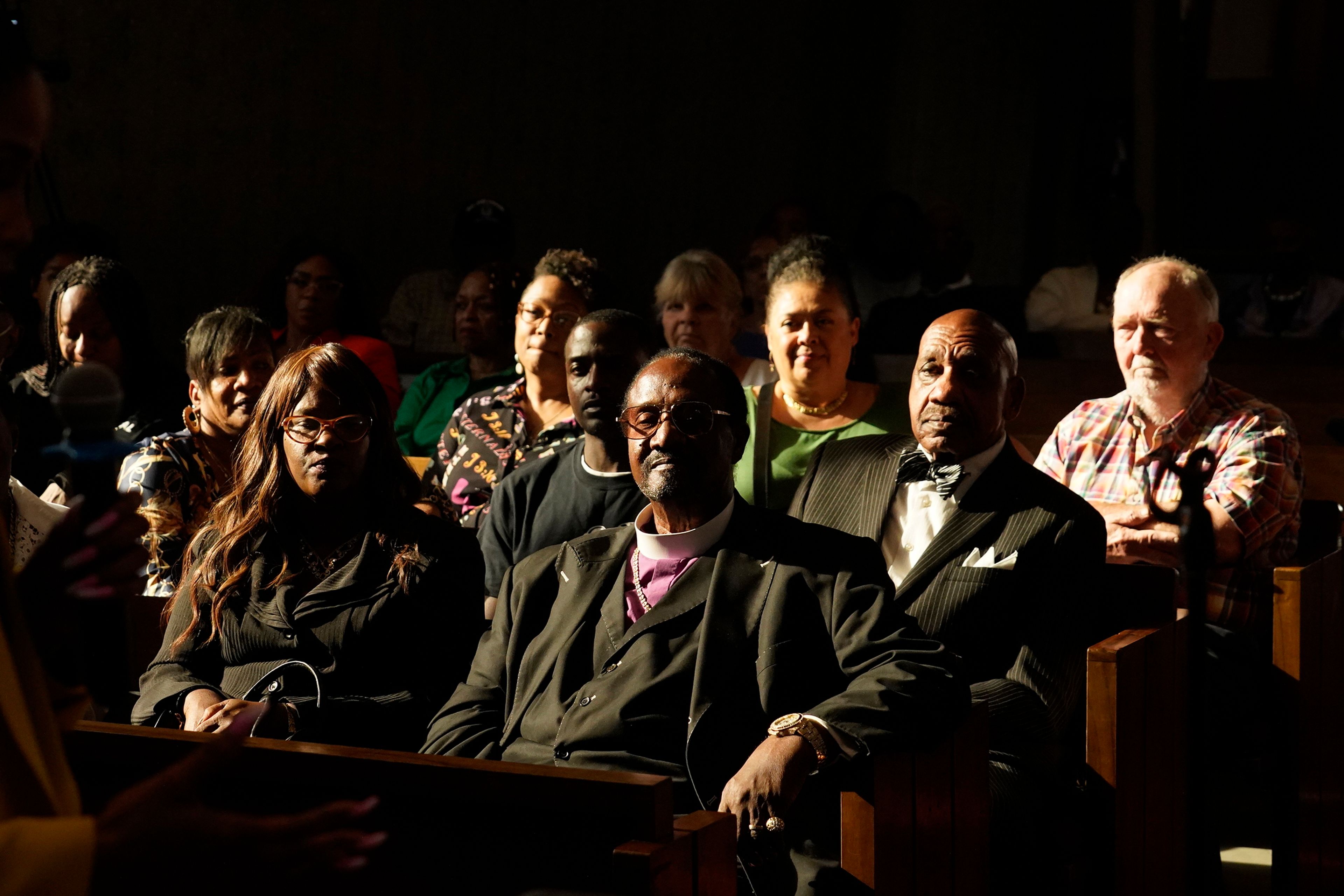 FILE - Palm Springs Section 14 neighborhood residents and descendants listen to Areva Martin, civil rights attorney, at the United Methodist Church in Palm Springs, Calif., Sunday, April 16, 2023. (AP Photo/Damian Dovarganes, File)