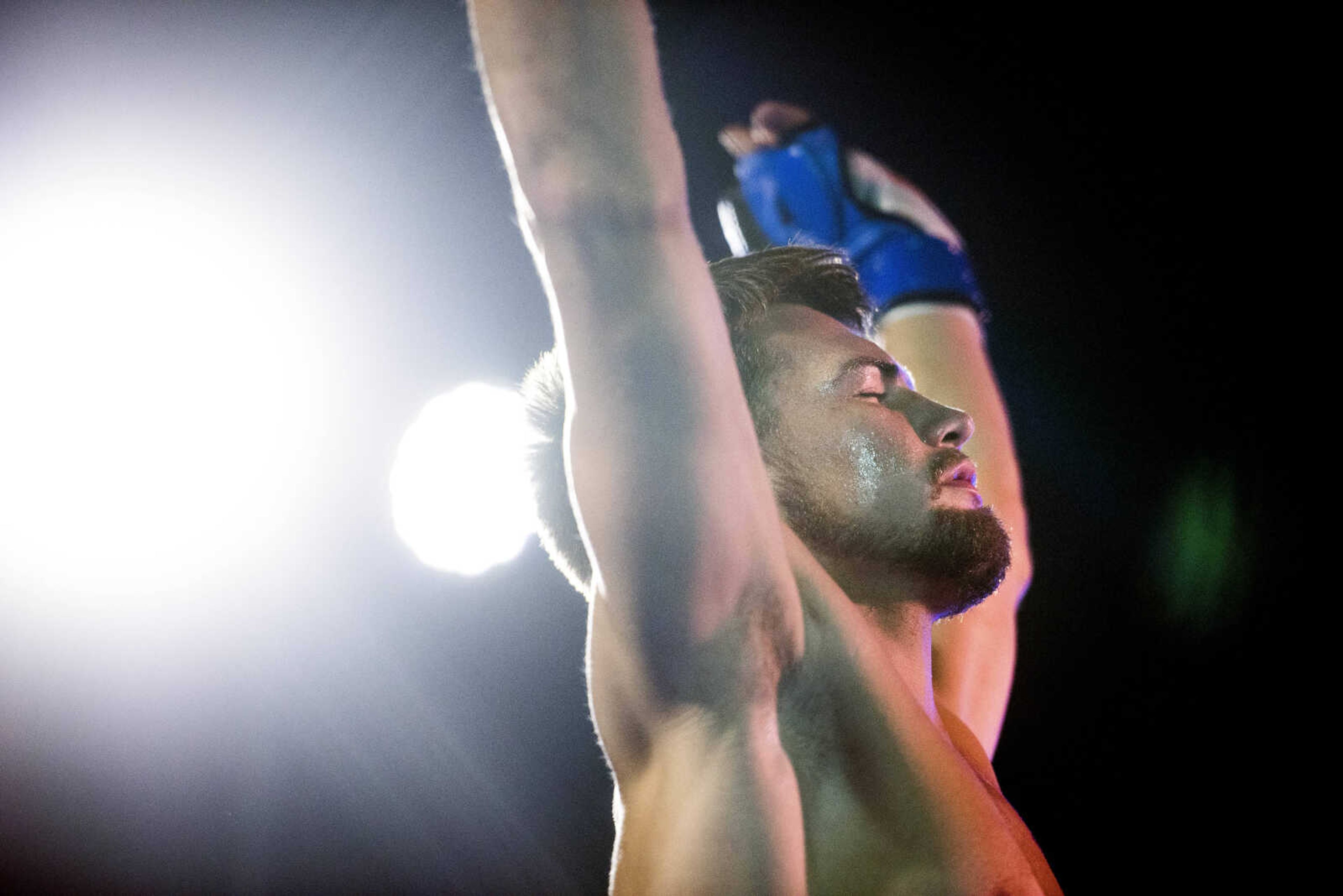 Nathan Stearns basks in cheers from the crowd after entering the ring for his first professional MMA fight Saturday, Nov. 2, 2019, at the A.C. Brase Arena in Cape Girardeau. "I'm here to win," he said before the fight. "But I'm also, I don't know, I'm a showman too."