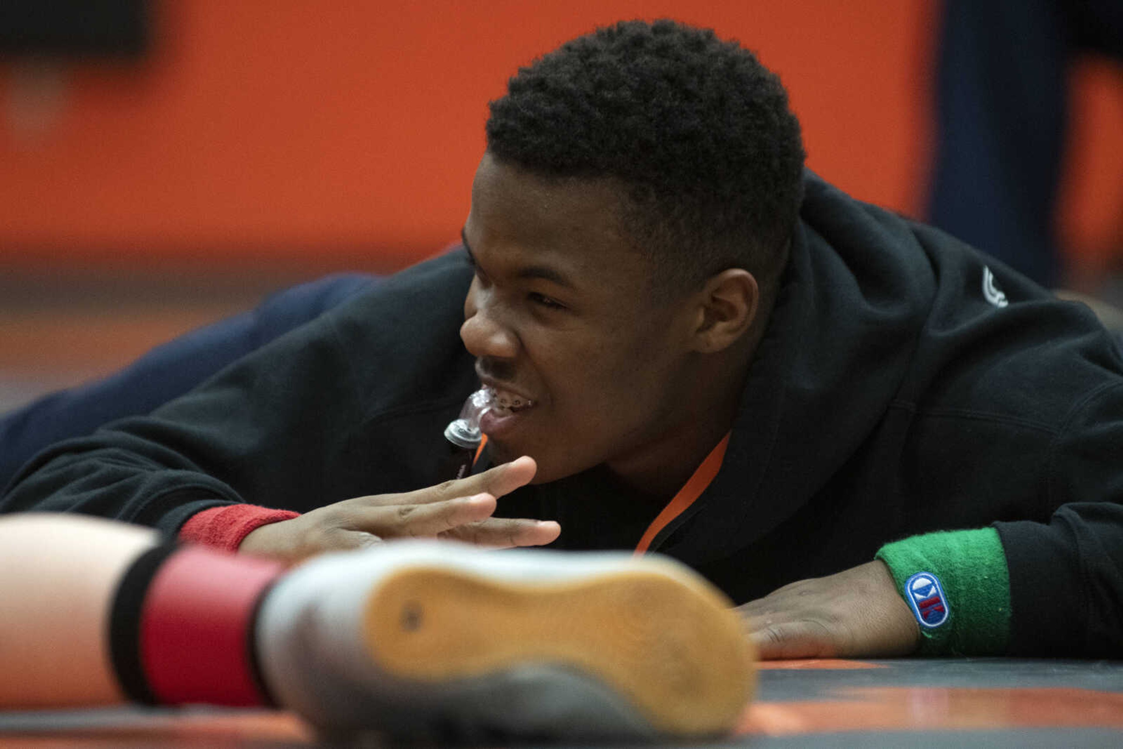 Joshua Pulle of Cape Girardeau, 17, referees a match Tuesday, March 19, 2019, at Cape Central High School.