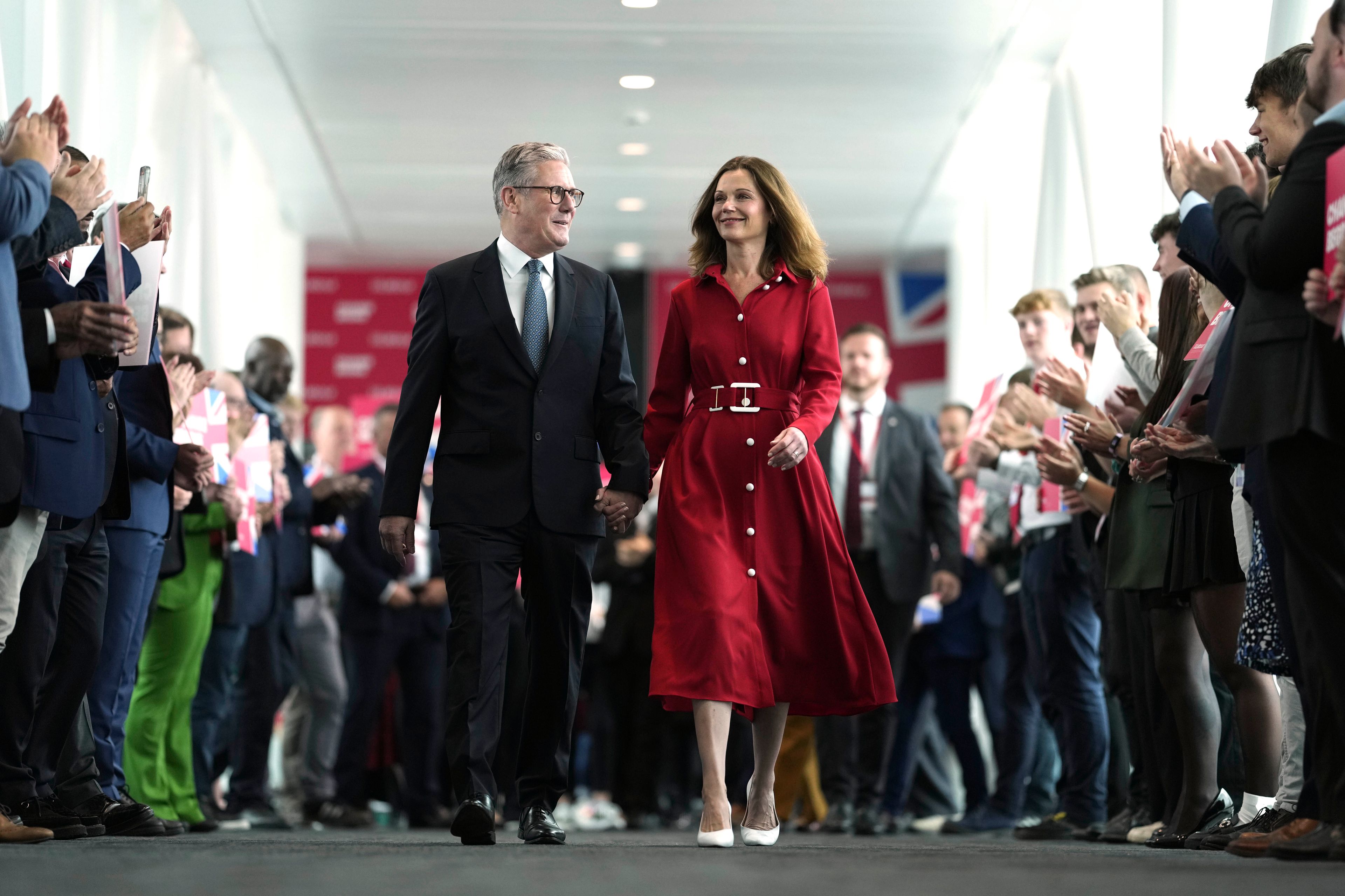 FILE - Britain's Prime Minister Keir Starmer and his wife, Victoria, arrive at the Labour Party Conference in Liverpool, England, Tuesday, Sept. 24, 2024.(AP Photo/Jon Super, File)