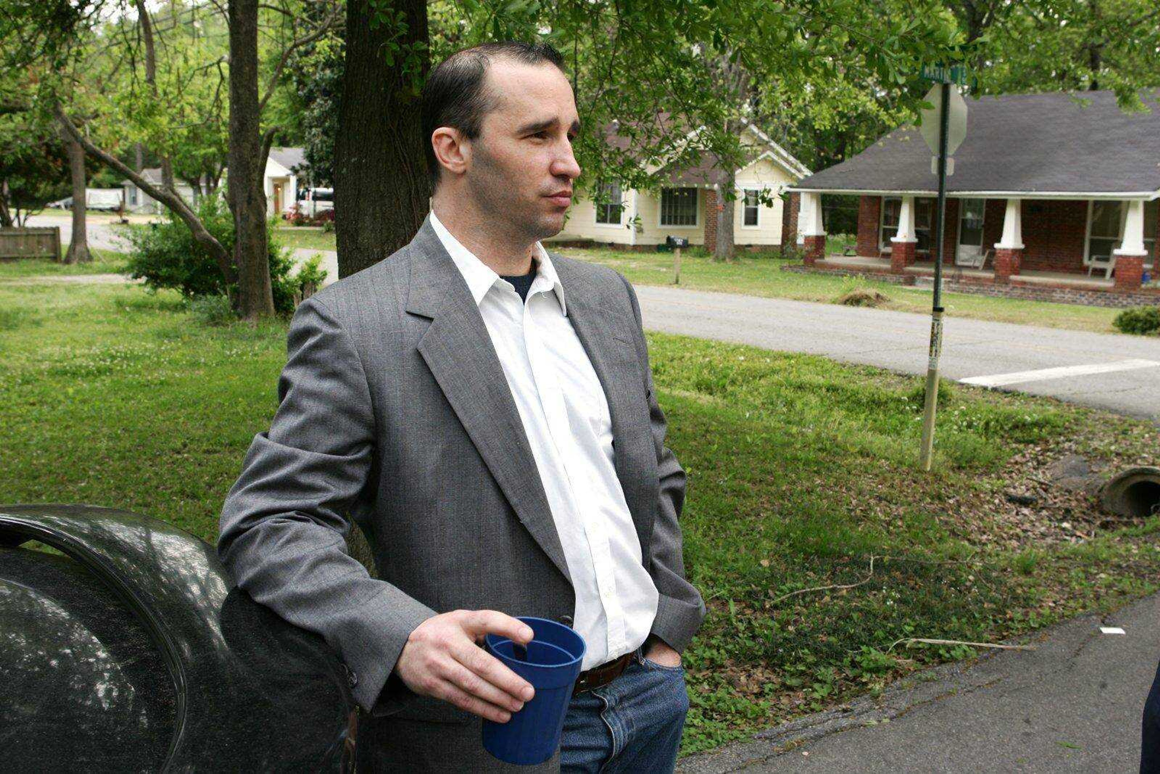 James Everett Dutschke on Tuesday stands near his home in Tupelo, Miss., waiting for the FBI to arrive and search his home in connection with the sending of poisoned letters to President Barack Obama and others. (Thomas Wells ~ Northeast Mississippi Daily Journal)