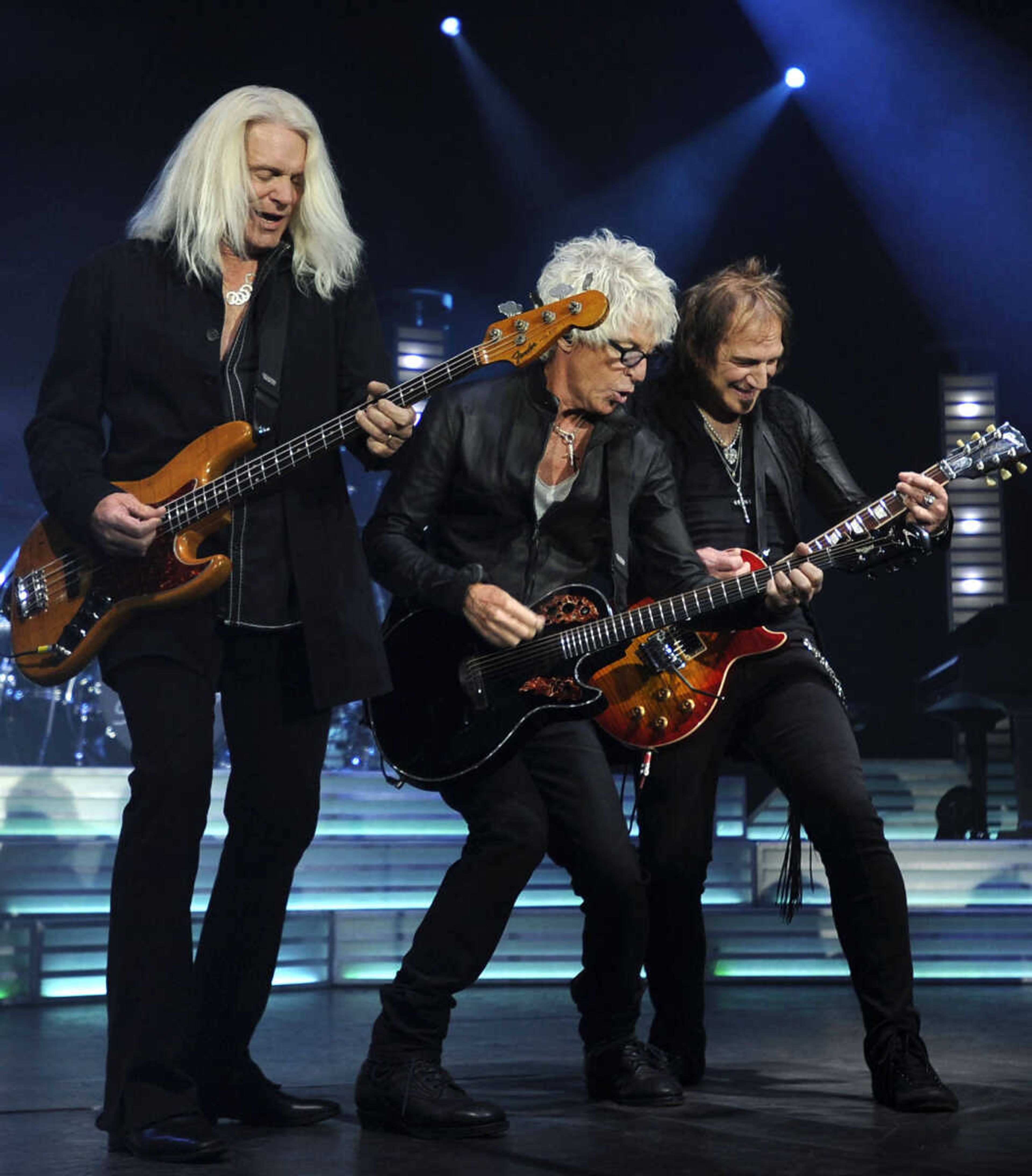 FRED LYNCH ~ flynch@semissourian.com
Bruce Hall, left, Kevin Cronin and Dave Amato perform with REO Speedwagon Thursday, Dec. 5, 2013 at the Show Me Center.