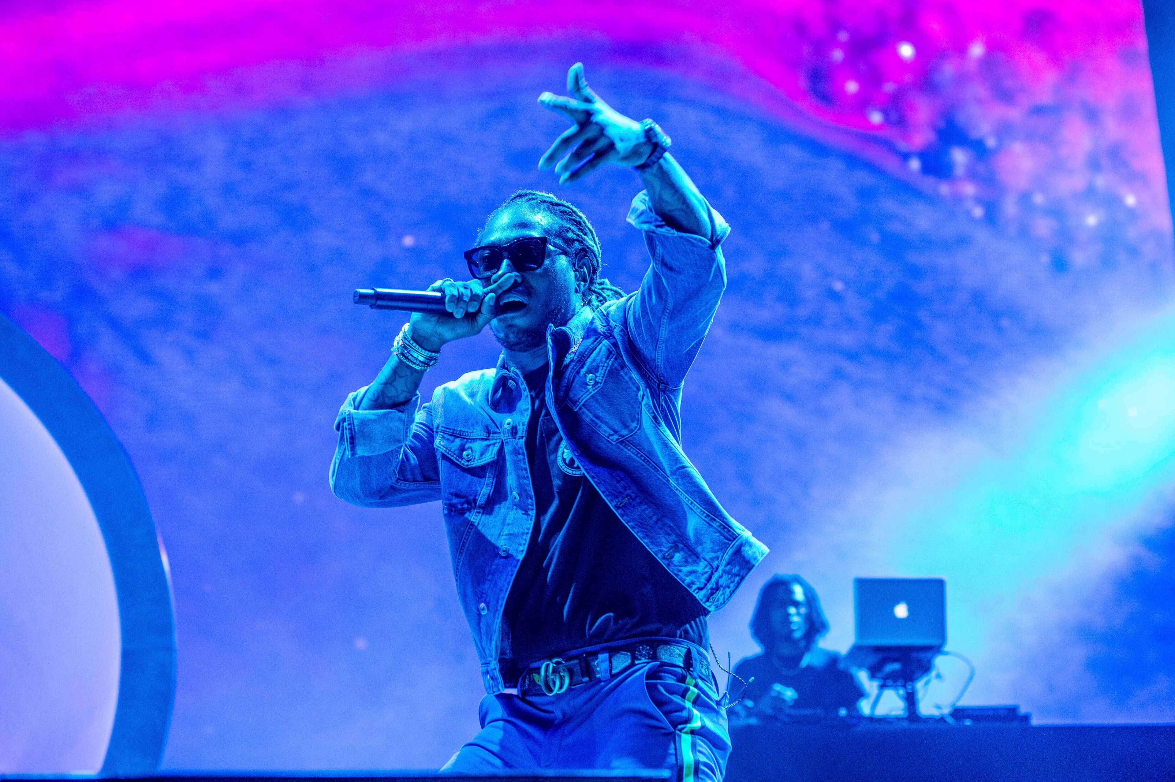 FILE - Future performs at the Bonnaroo Music and Arts Festival, June 10, 2018, in Manchester, Tenn. (Photo by Amy Harris/Invision/AP)