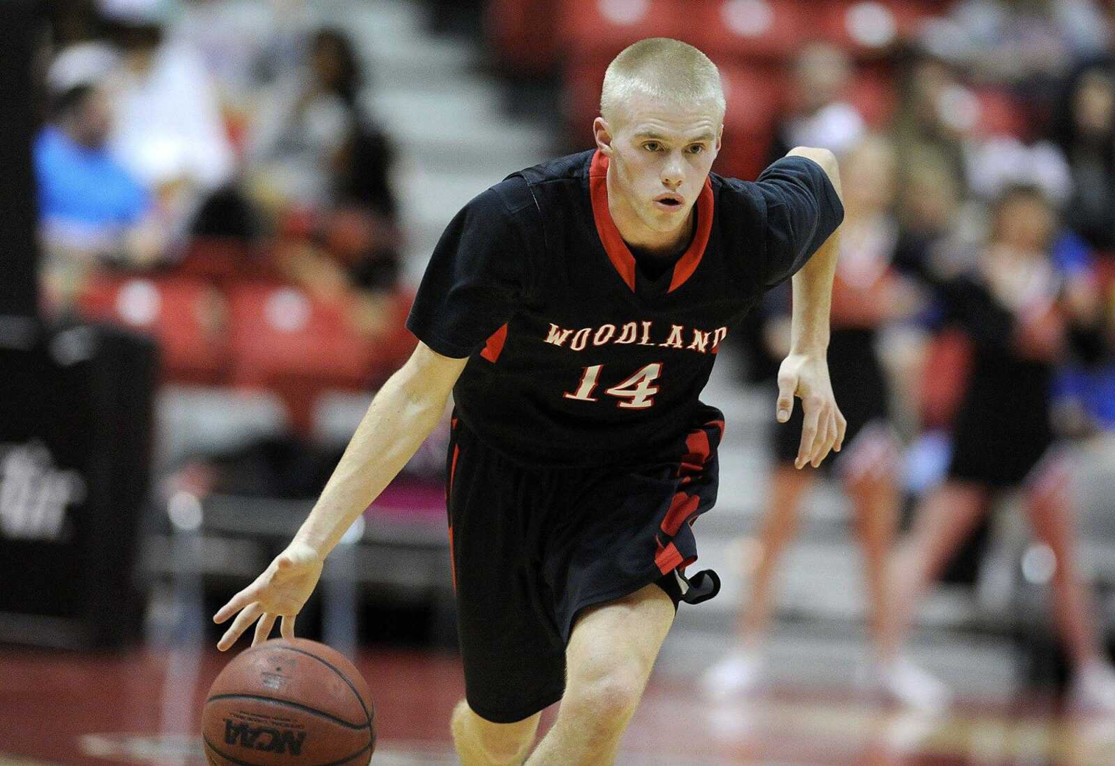 Woodland's Garret Reynolds drives down the court in the fourth quarter of a fifth-place semifinal against Advance on Monday during the Southeast Missourian Christmas Tournament at the Show Me Center. Woodland won 56-52. (Laura Simon)