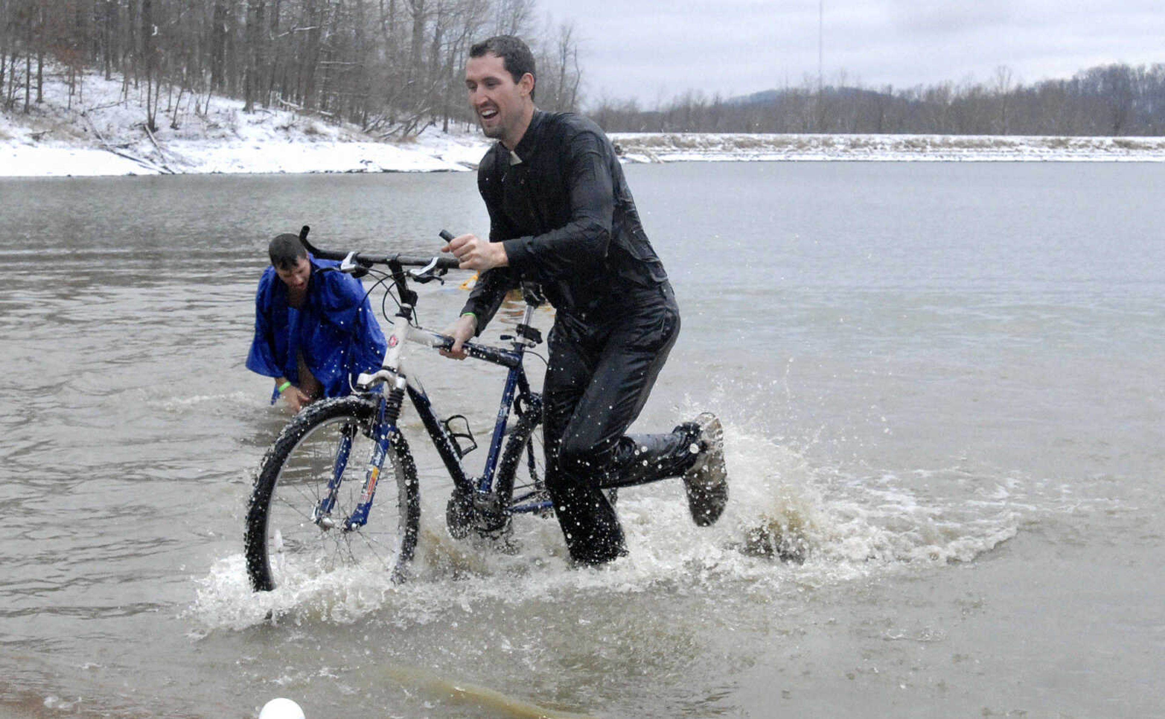 LAURA SIMON~lsimon@semissourian.com
A member of the 'Holy Rollers' plunge team emerges from Lake Boutin in Trail of Tears State Park Saturday, February 6, 2010 during the Polar Bear Plunge benefiting the Special Olympics. The Special Olympics hopes to raise 36,000 during this years Polar Bear Plunge. Over 210 people plunged into Lake Boutin Saturday.