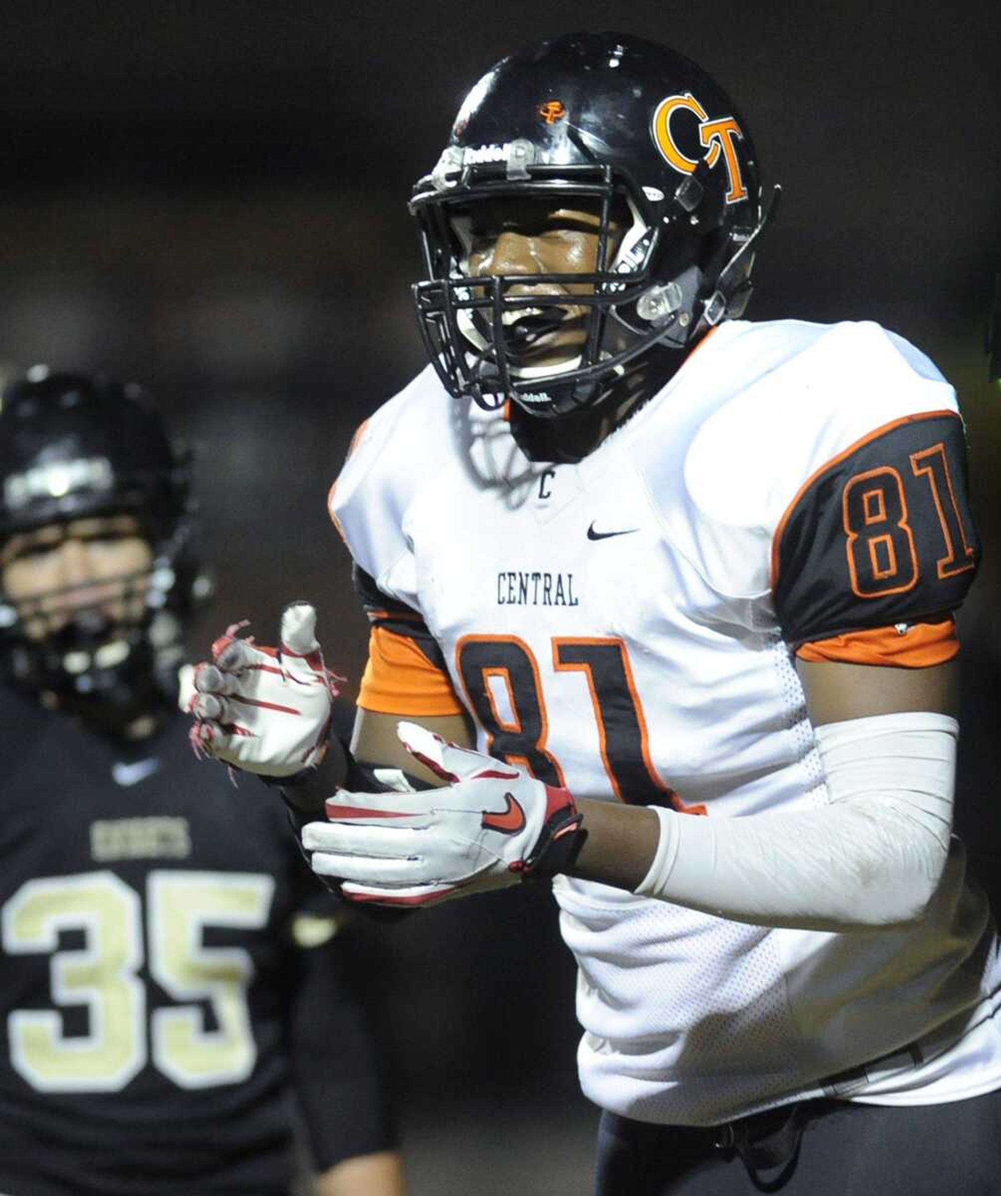 Central's Andre Statam celebrates after scoring on a 24-yard pass from Peyton Montgomery against Farmington during the third quarter Friday, Oct. 3, 2014 in Farmington, Missouri. (Fred Lynch)